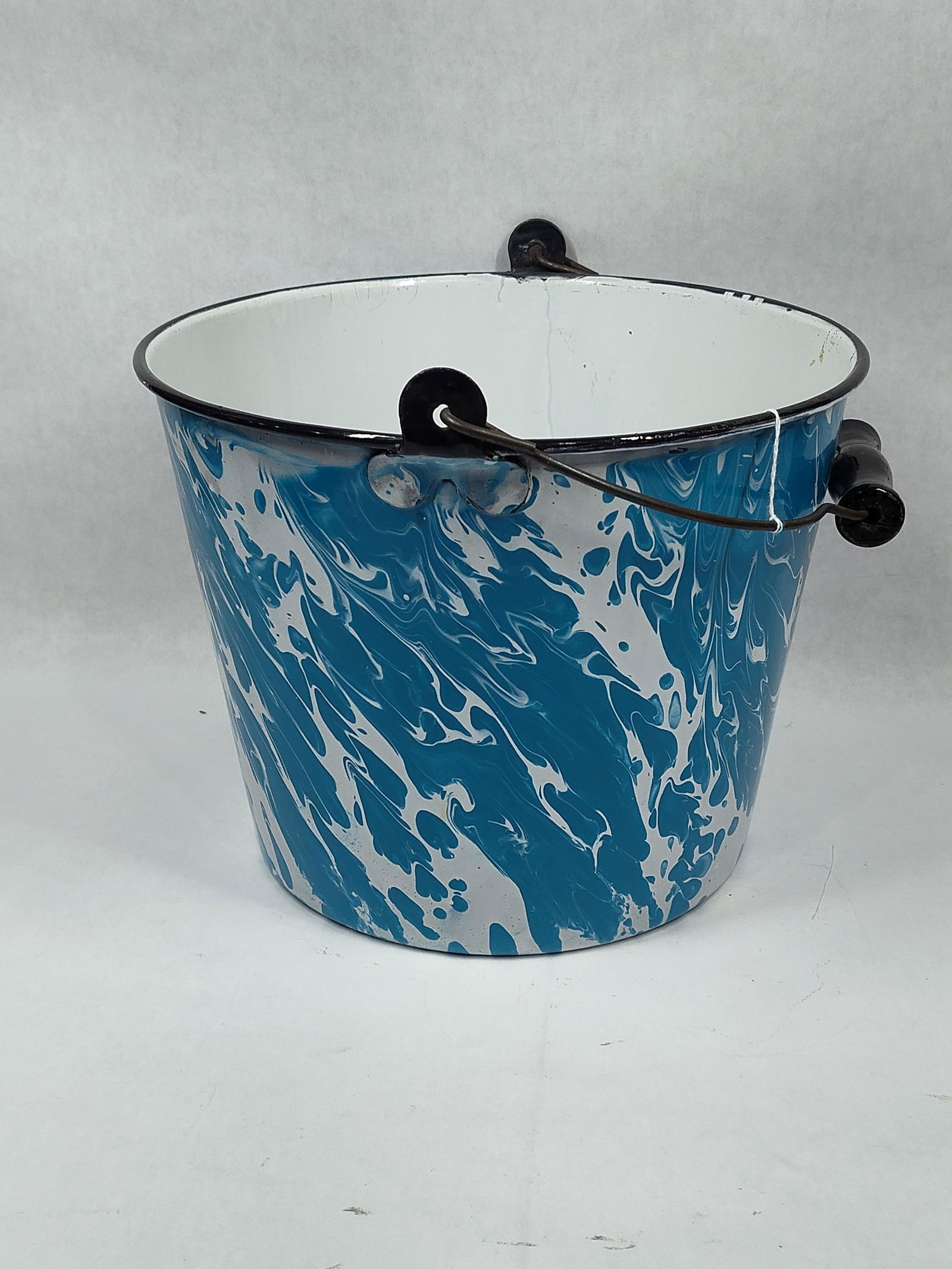 Blue Swirl Enamel Ware Granite Pail w/ Bale Handle: Great overall condition showing very little enamel loss with handle fully intact with a diameter of 11.5 