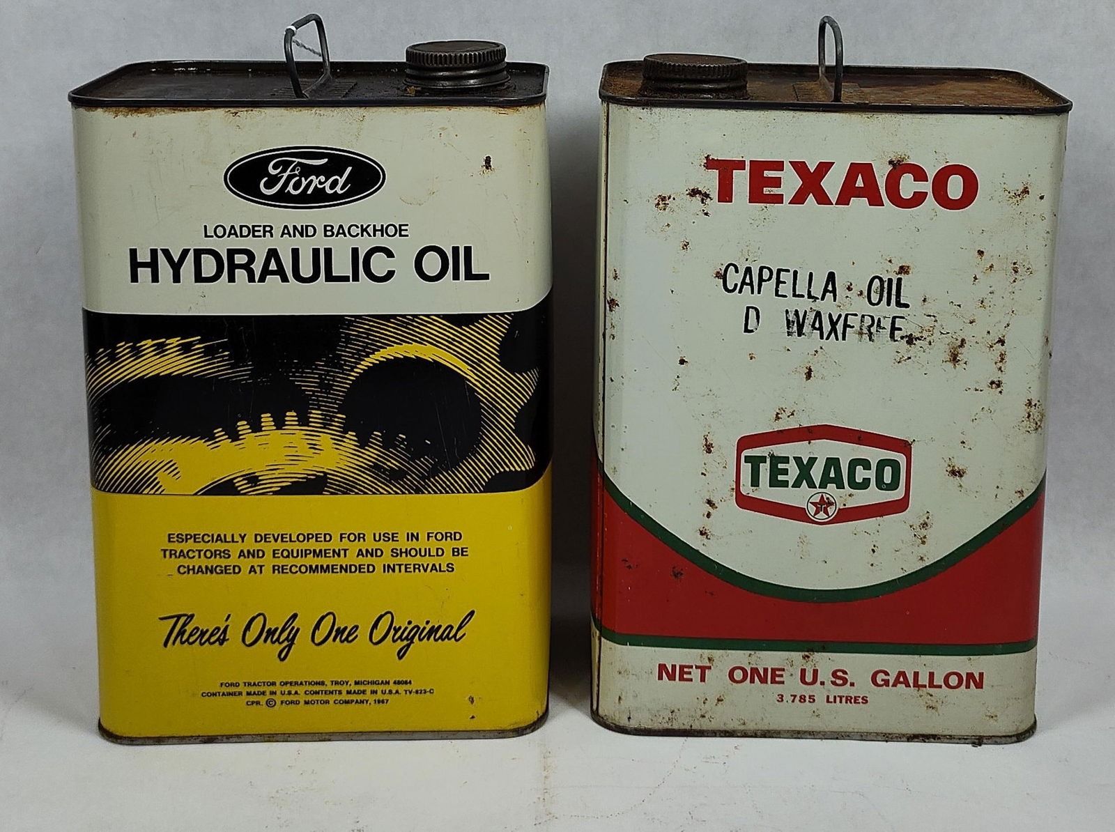 Texaco and Ford One Gallon Oil Cans: Great graphics to each with minor areas of condition soiling and or finish loss due to age 
