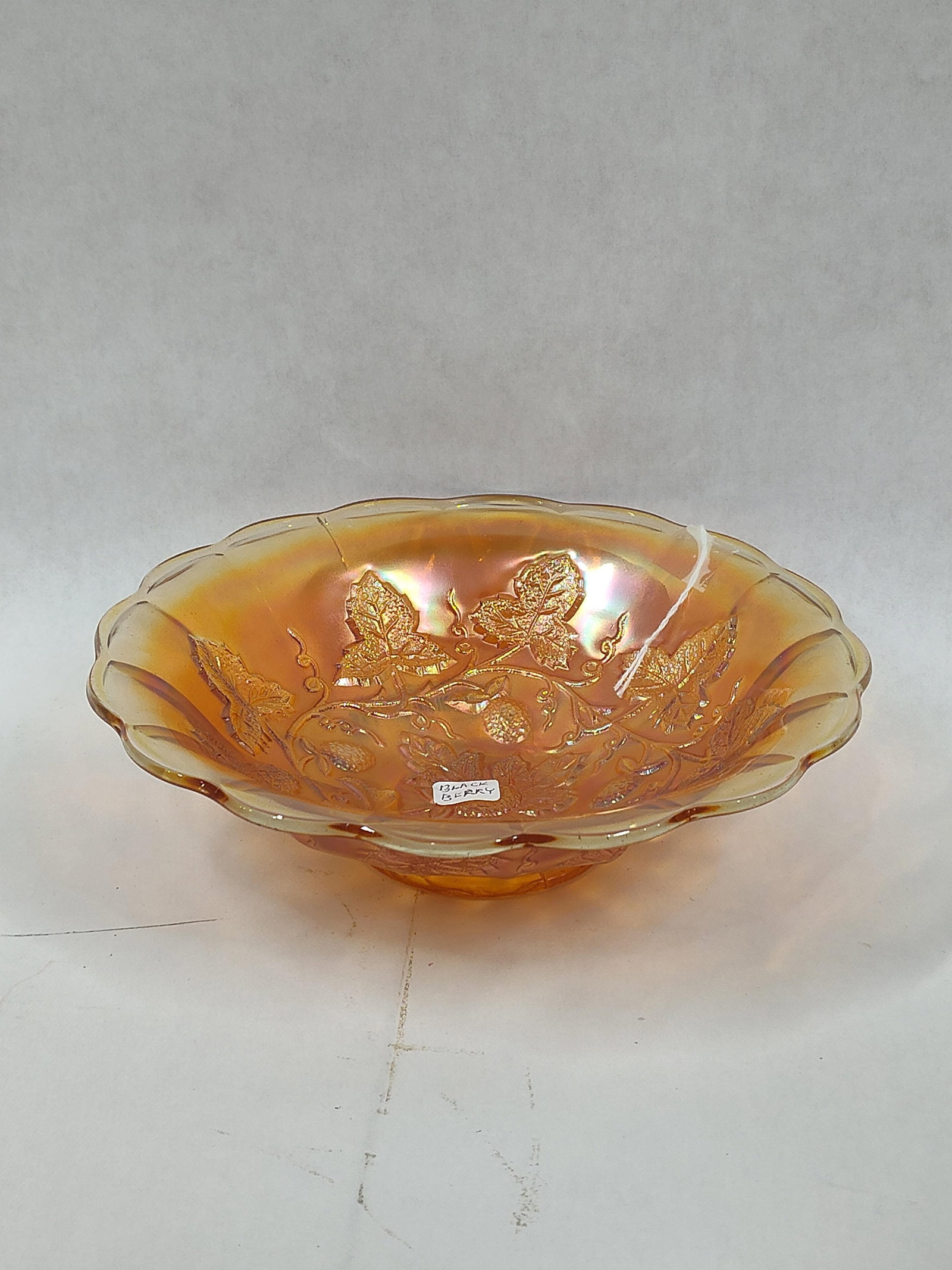 Marigold Black Berry Candy Bowl: Embossed design with a great orange iridescent color. 2.5x8. No chips and cracks.