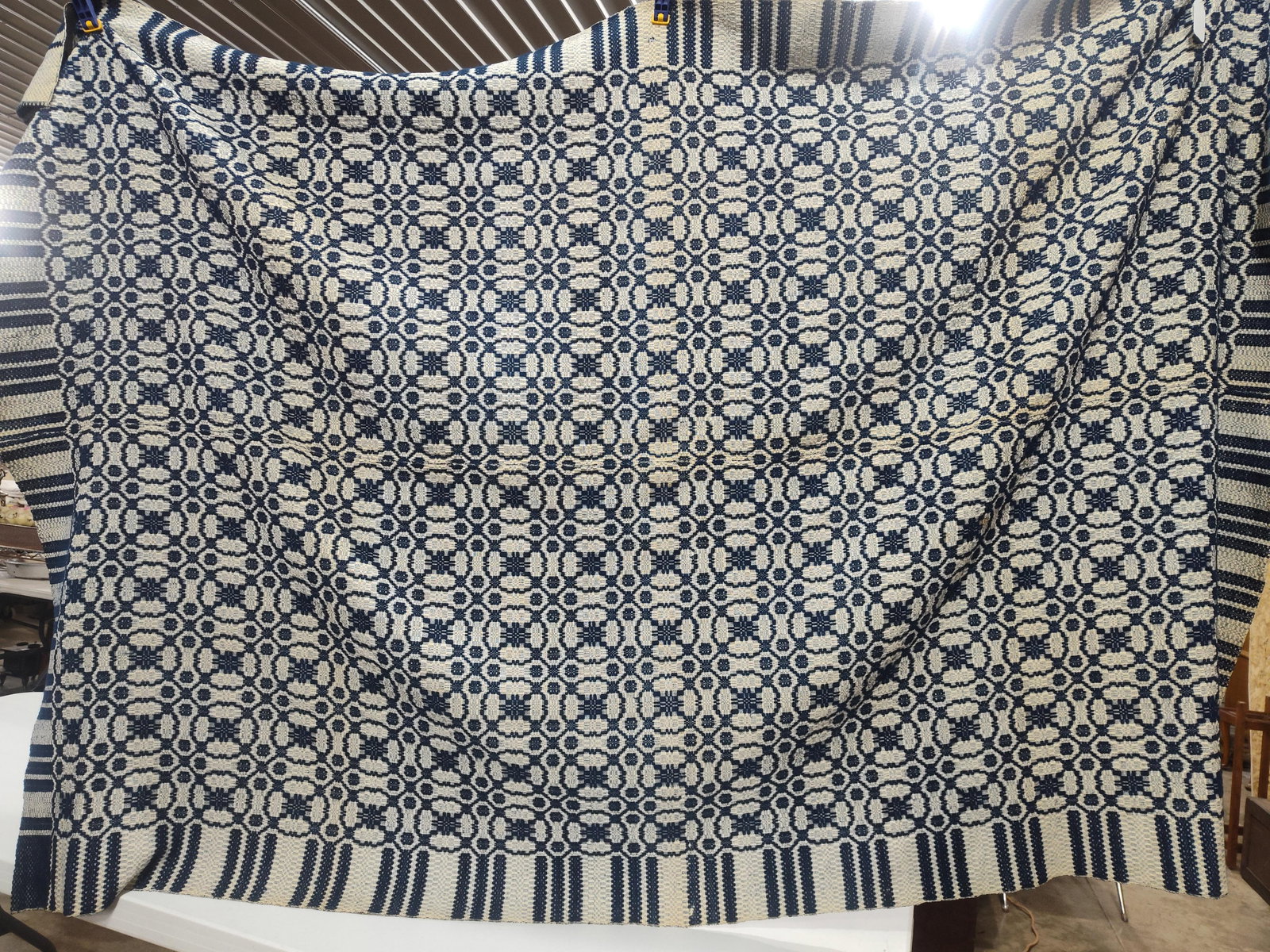 Antique Homespun Blue and White Jacquard Woven Wool Coverlet: showing minor areas of wear and thinning due to age and usage with areas of discoloration 64 x 96