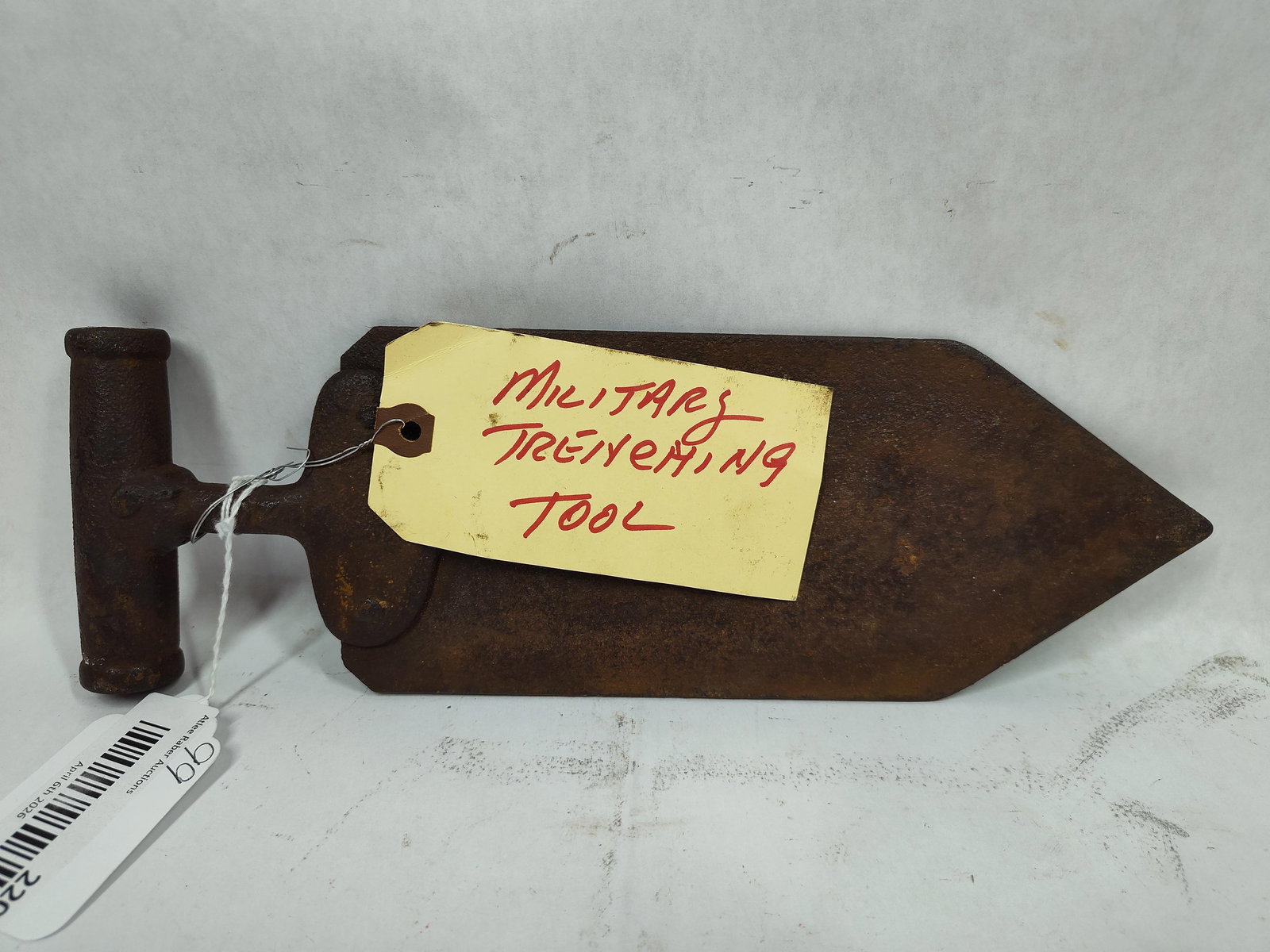 Military Trenching Tool: All metal with a pointed tip and handle. 12x4