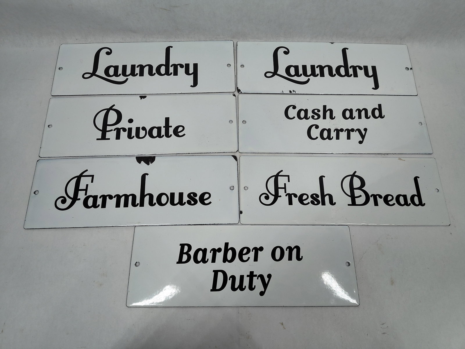 Single Sided Porcelain Placards Inc. Fresh Bread, Barber on Duty, Cash & Carry, Laundry, Farmhouse: This great lot of porcelain signs include an assortment of sayings as these are newer decor pcs. measuring 3.5 x 10
