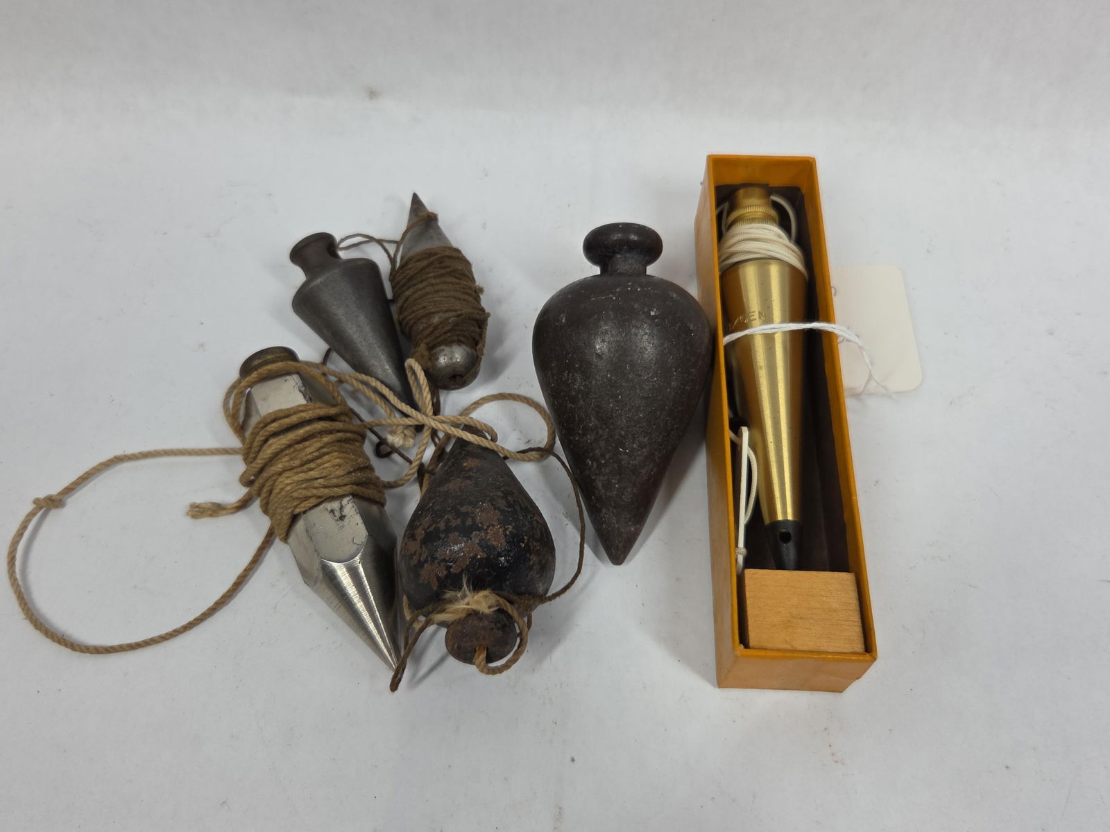 Dietzgen and Other Plumb Bobs: One with original box. Several are brass.
