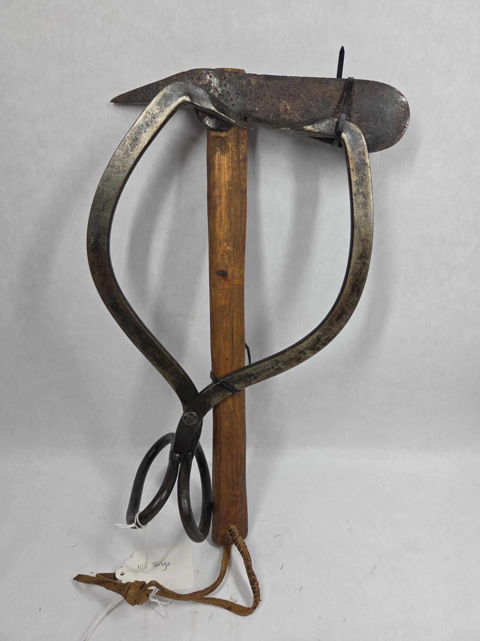 Ice Tongs & Hatchet: Hatchet features a rounded edge and pick tip with 16 inch handle.