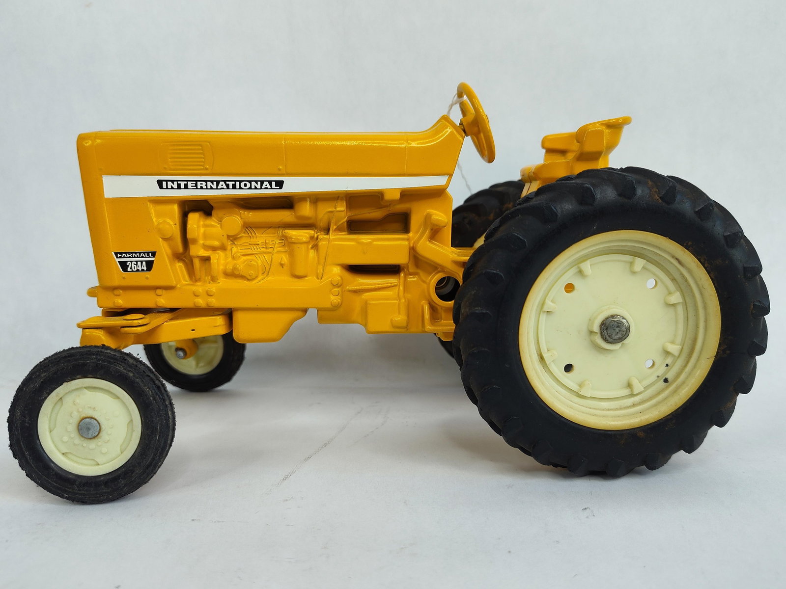 Ertl International WF 2644 Industrial Tractor: Out of box in overall good played with condition showing soiling as well as wear?1/16 scale?
