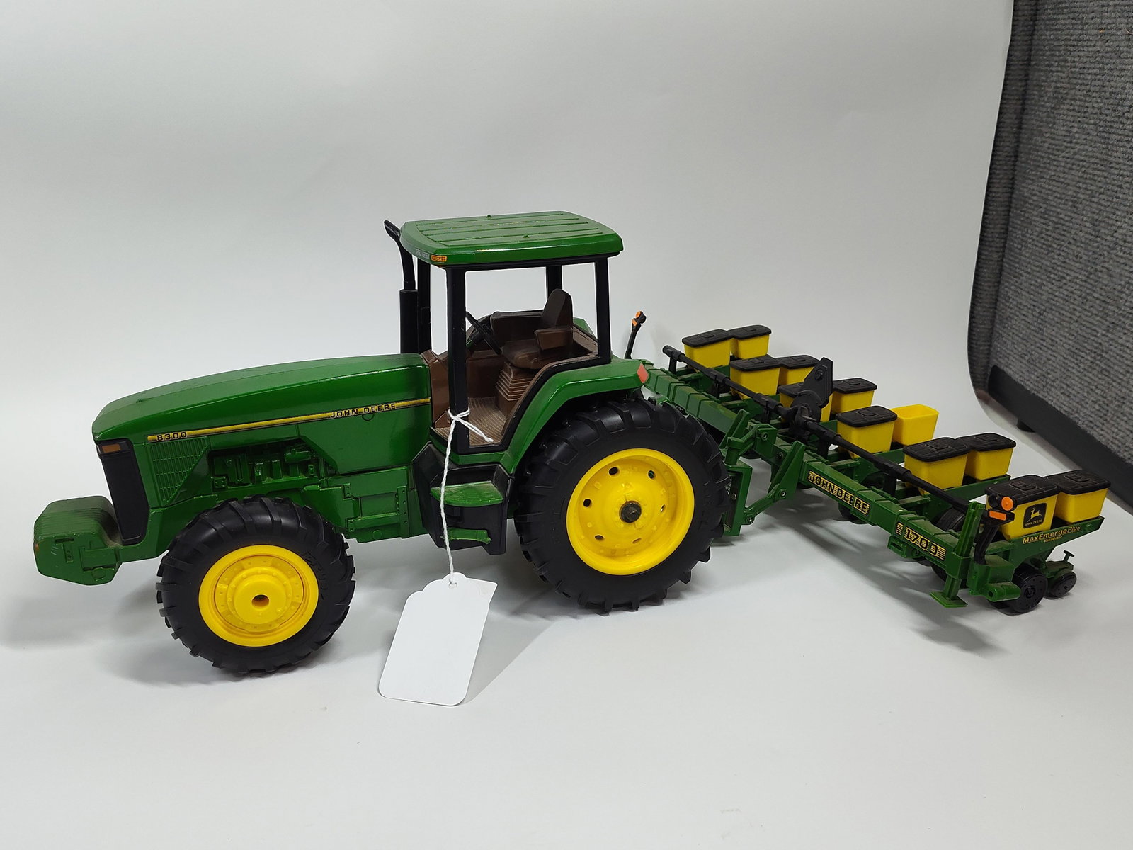 John Deere 8300 Tractor w 1700 Planter: Out of box, made by Ertl, 1/16th scale. One lid missing from seed bin.