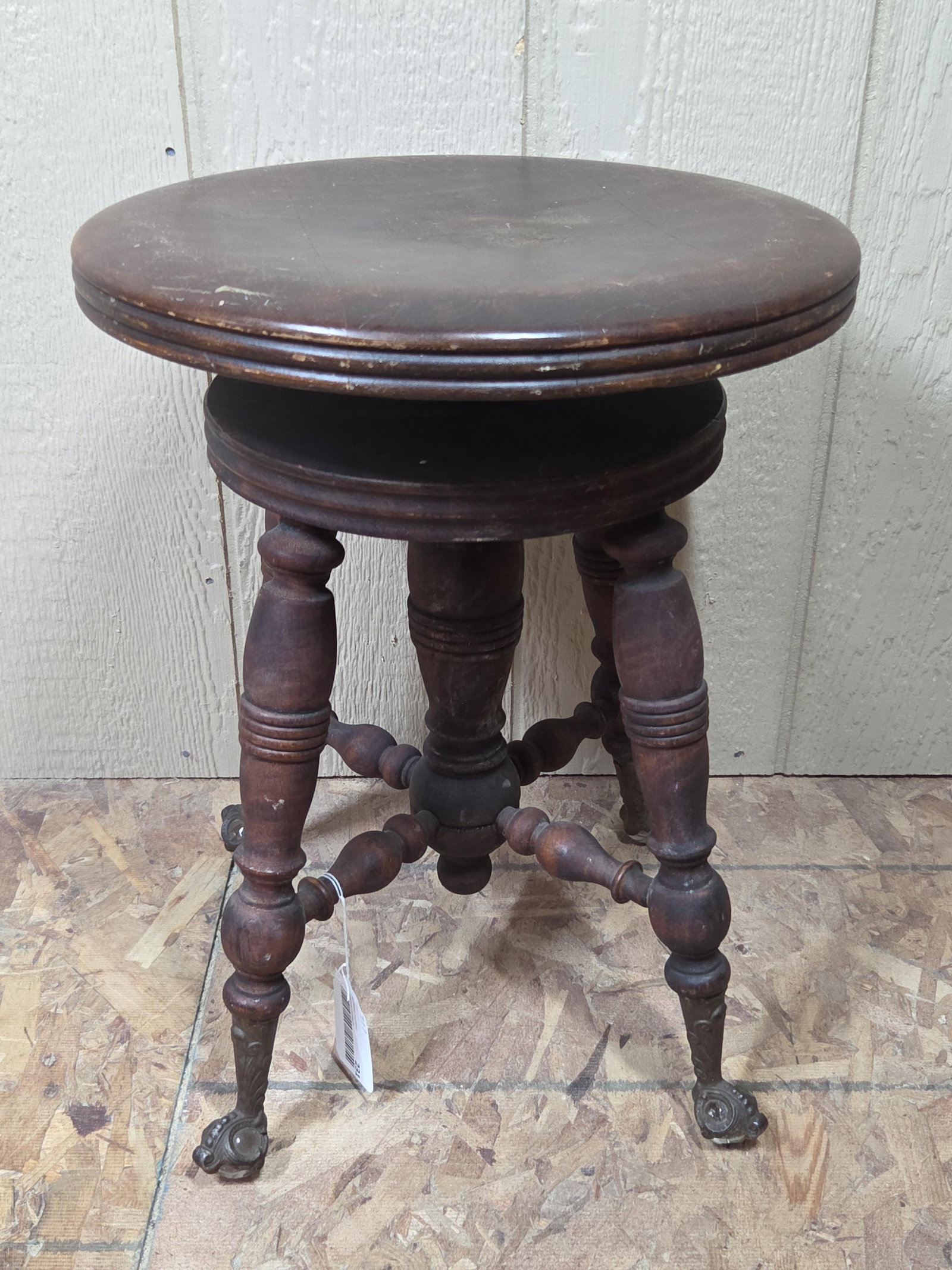 Oak Adjusting Piano Stool: Brass and glass ball claw foot. Good condition. 18 inches tall
