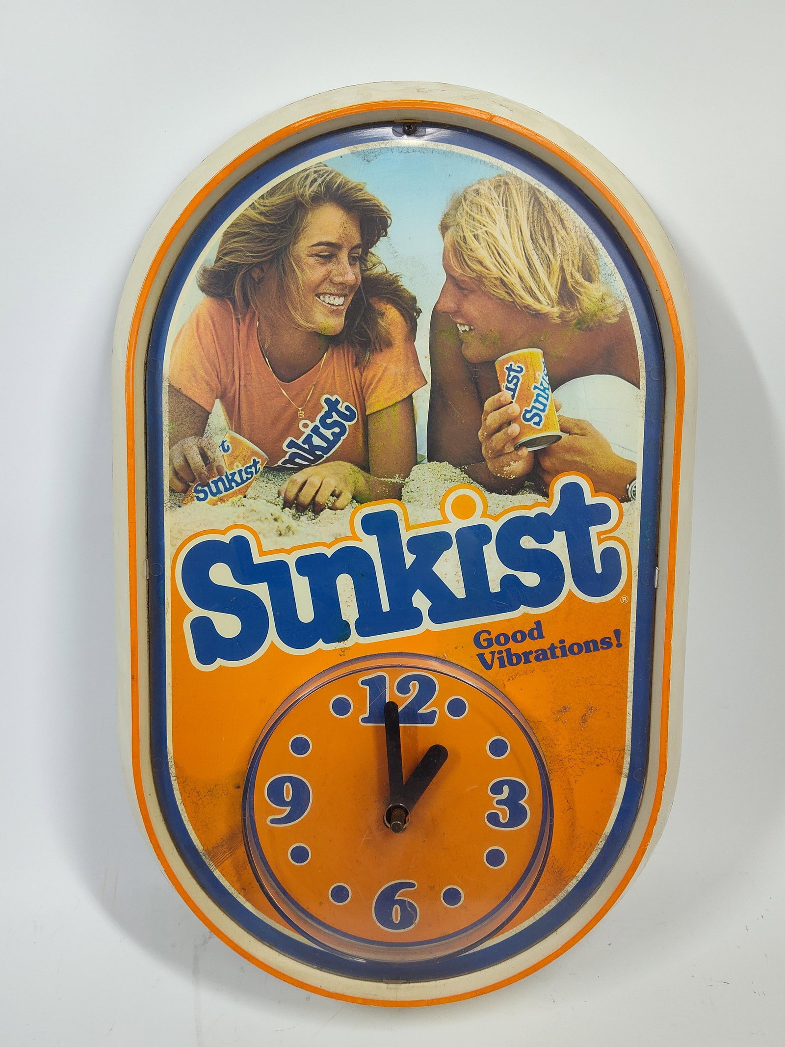 Sunkist Good Vibrations Clock: 19x11, plastic body. Small crack to top screw area. Working