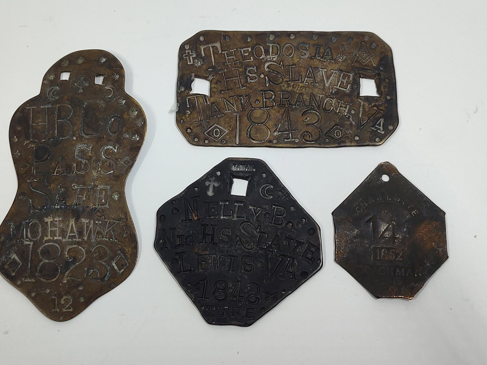 Historical Slave & Servant Brass Tags: 4tags, dated mid to early 1800s. With stamped details including names and locations. Roughly 2 to 4 inches