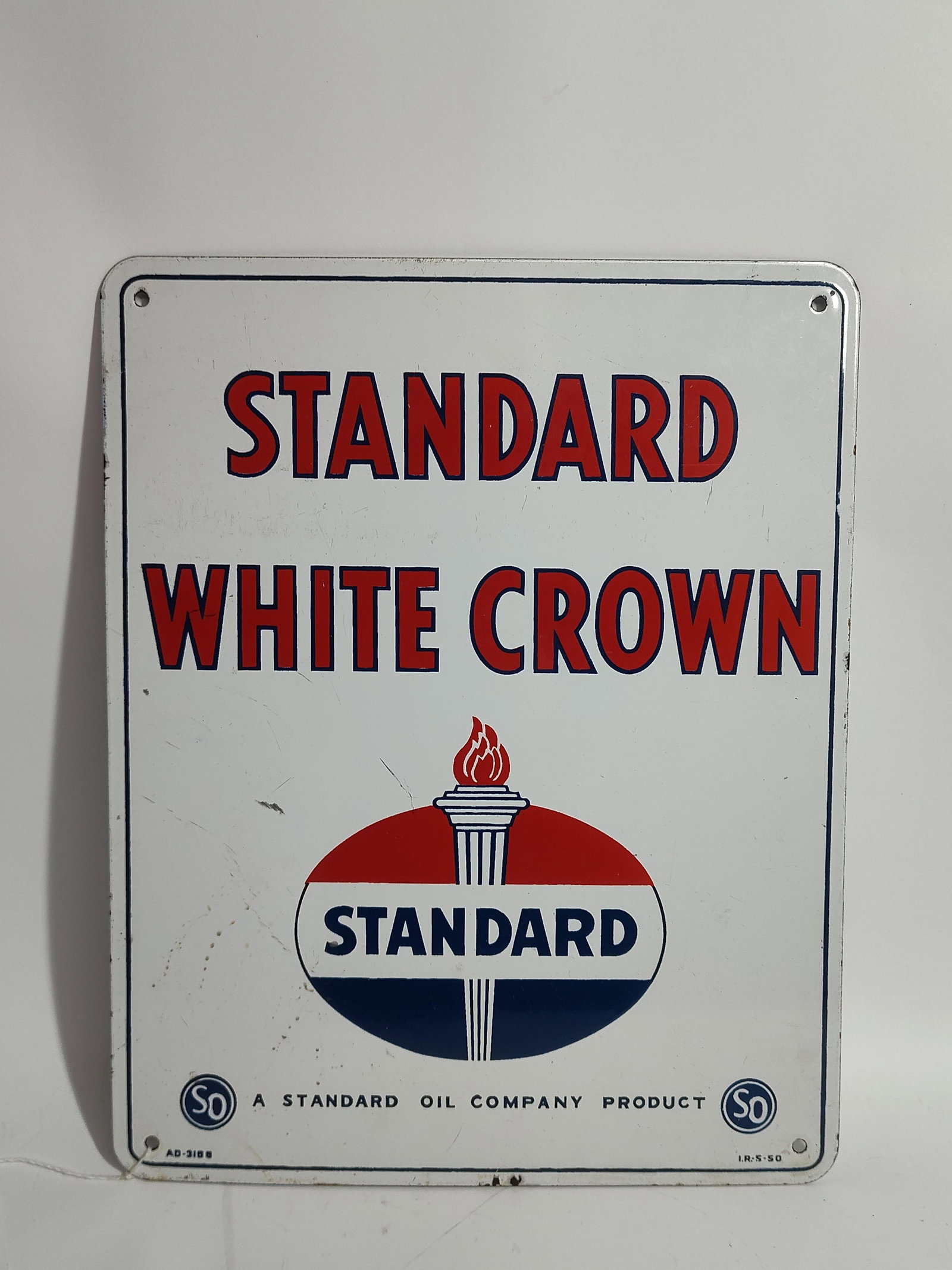 Standard White Crown Porcelain Sign: Single sided. Dated IR 5-50. Overall good clean condition. 15x12