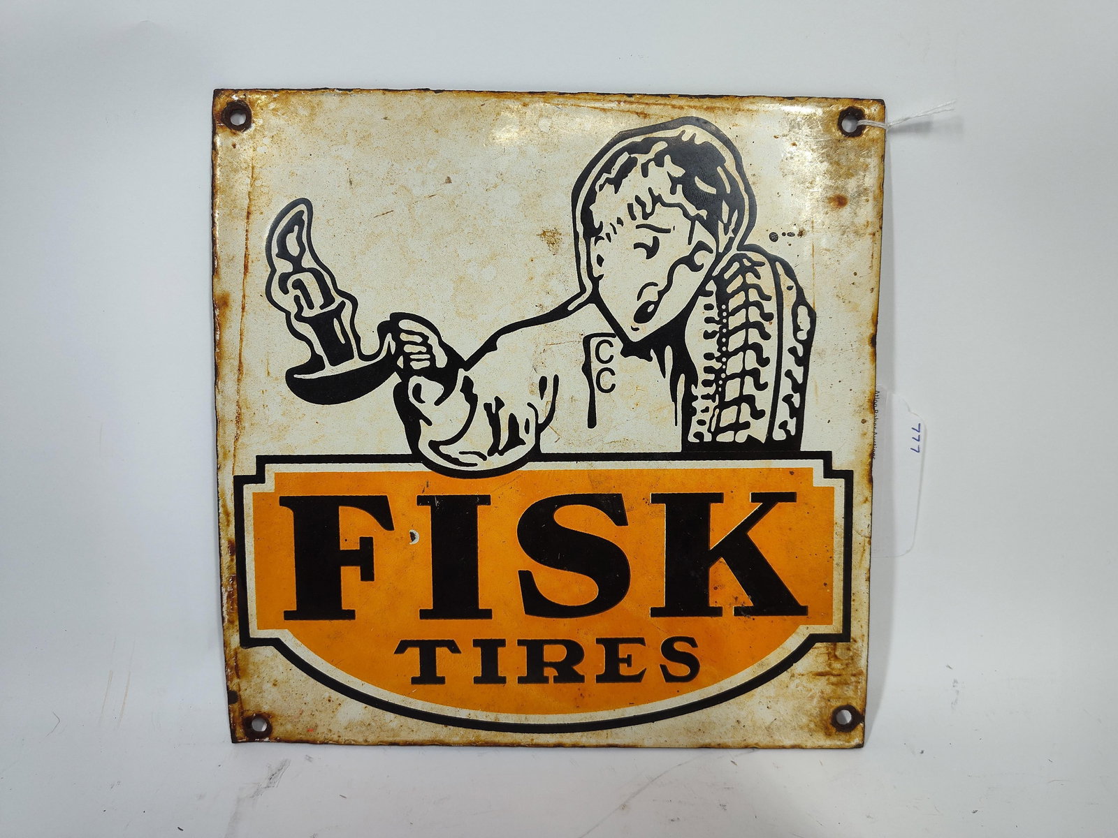 Porcelain Fisk Tires Sign: Discoloring along edges and throughout. Single sided. 9x9