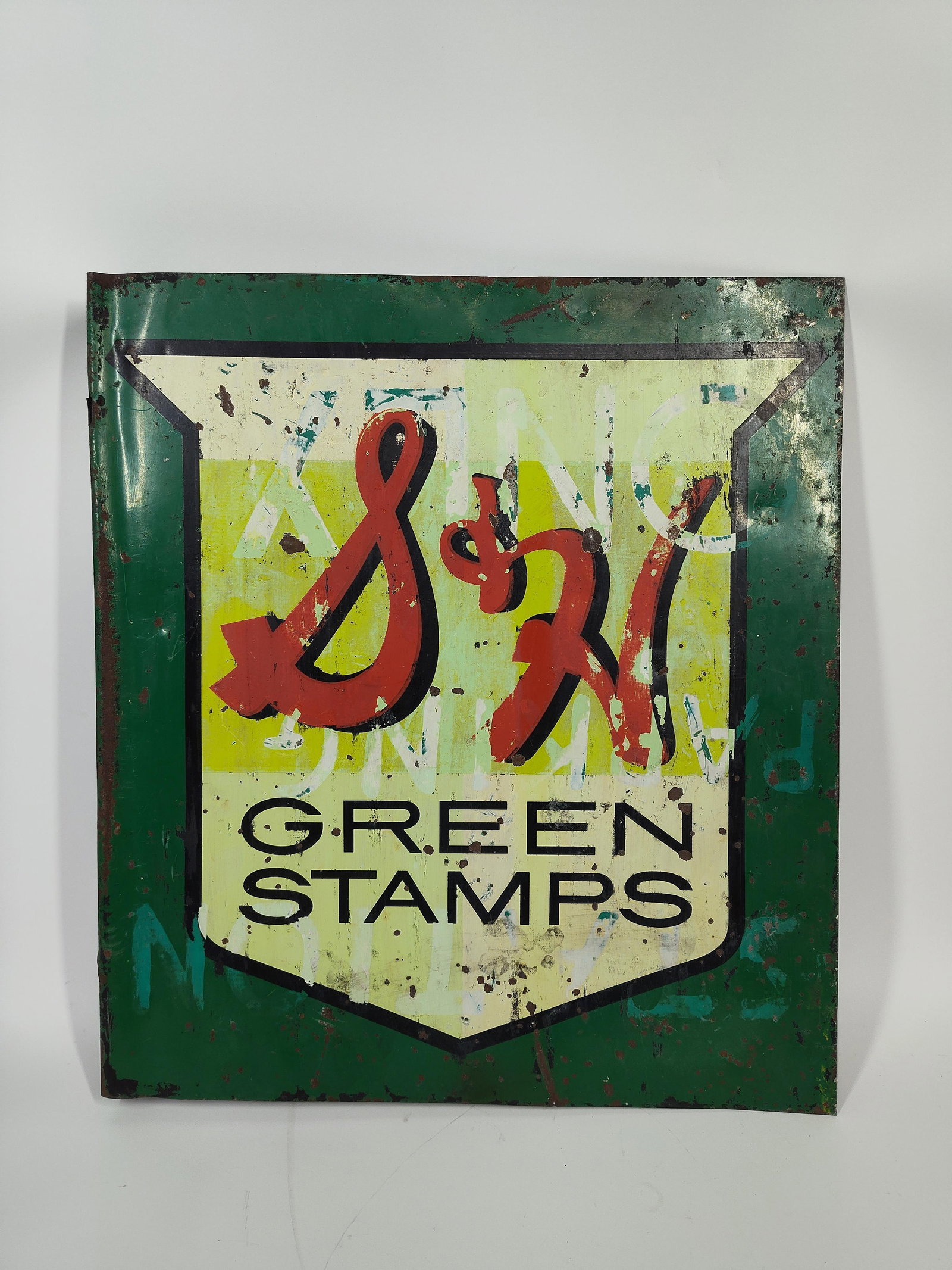 S&H Green Stamps Flange Sign: Double sided. Someone has painted over a good portion of one side and minor on the other. Several dings and spots are on both sides. 17x15.5