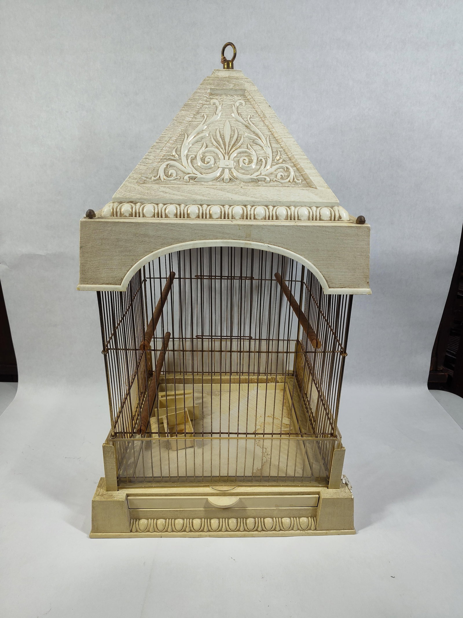 Victorian Era Cathedral Style Hanging Resin Bird Cage: Appearing to be complete measuring 26 in H