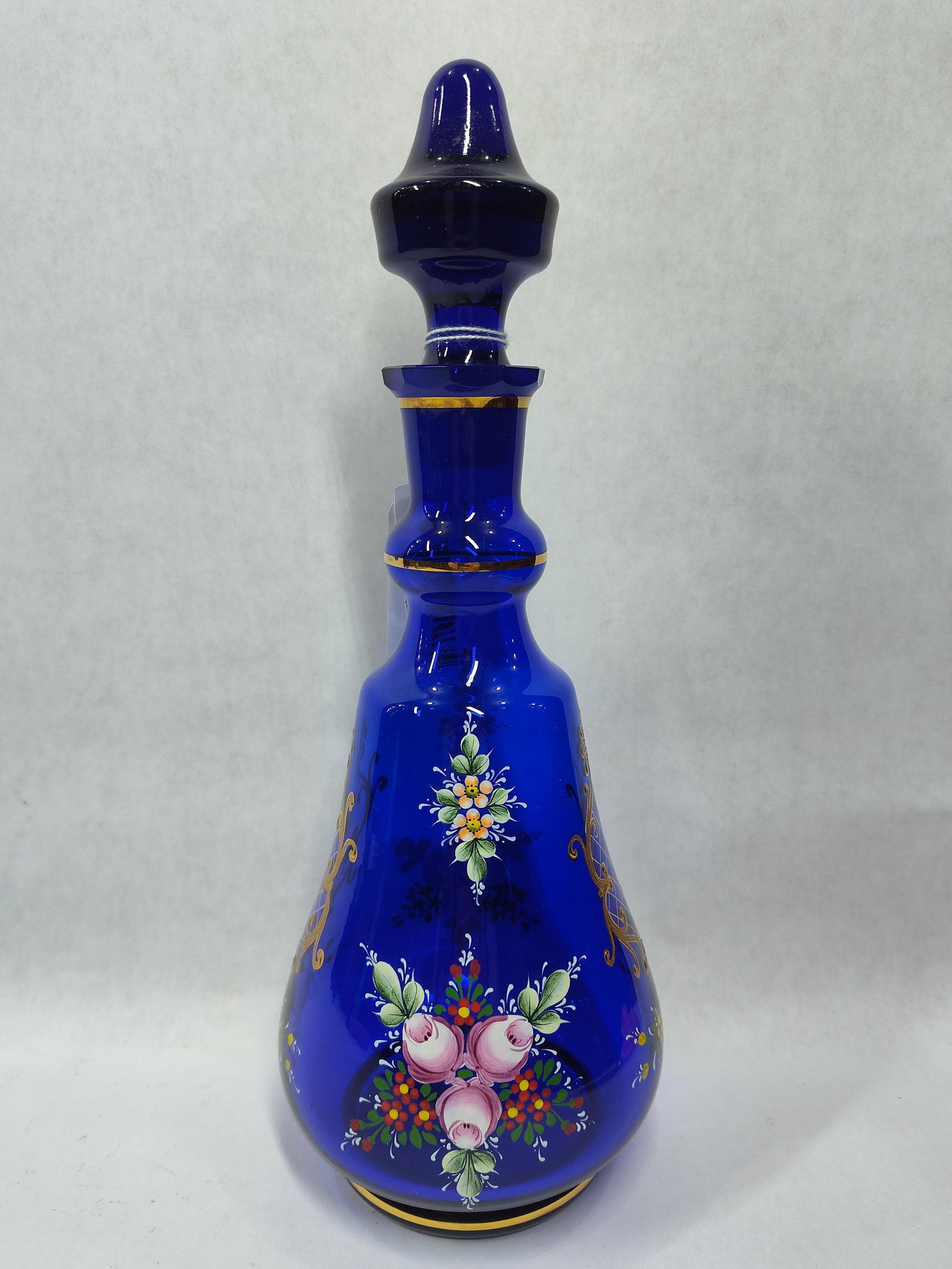 Antique Bohemian Hand Painted Cobalt Blue Glass w/ Gold Gilt Accents Decanter: Great early condition standing 13 in H with original stopper and showing no chips, cracks or breaks