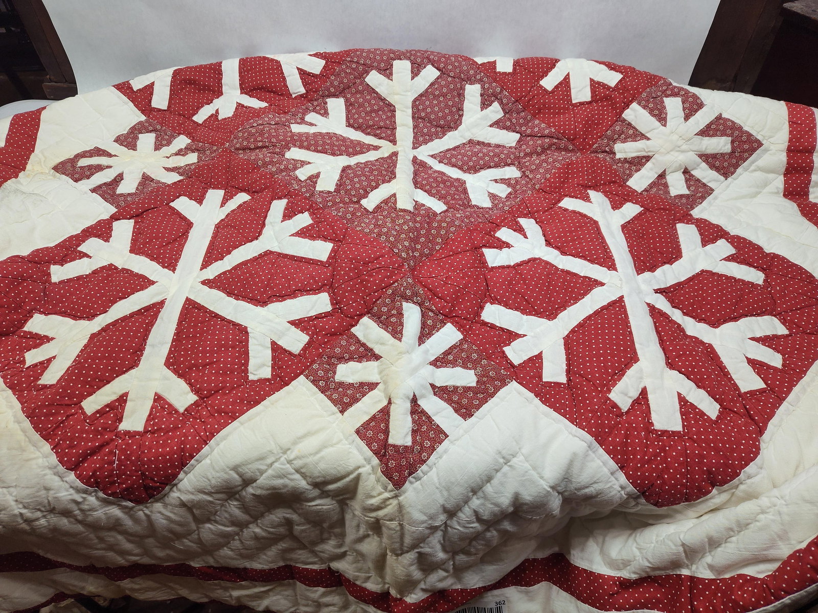 Red & White Snowflake Quilt: Hand stitched,some color bleeding and minor stains are found. Approx 46x52