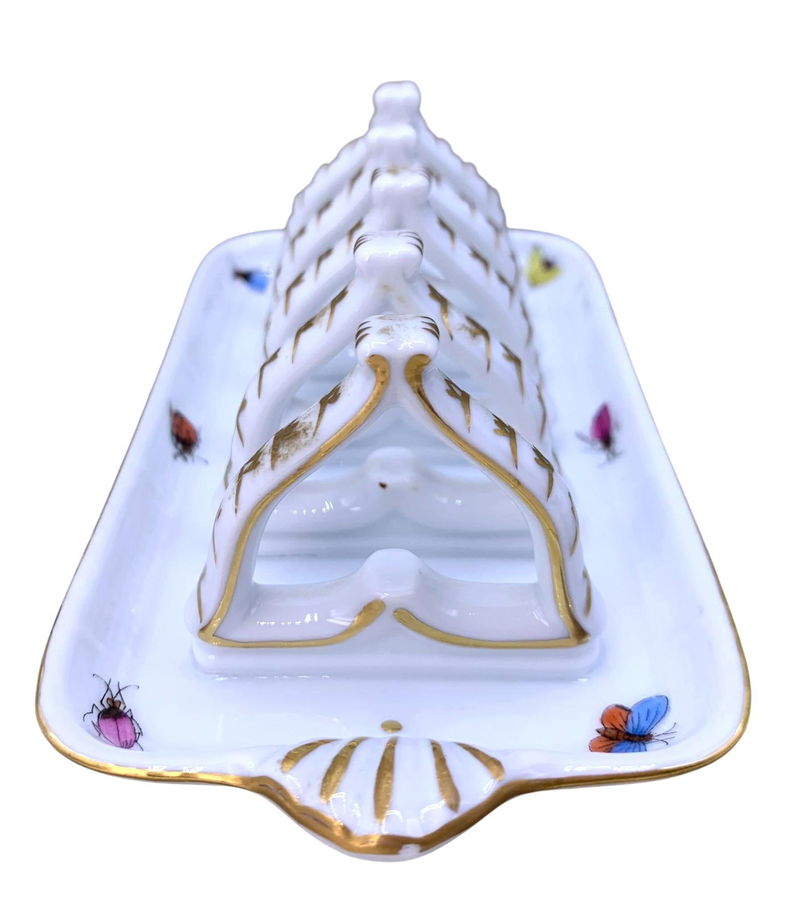 Vintage HEREND Hungarian Hand Painted Insect, Bug, Butterfly Fine Porcelain 4 Slice Toast Rack: Finely painted and highlighted in gleaming gold, measuring 5 7/8 IN x 3 IN x 2 1/4 IN, marked on the underside with no structural issues.