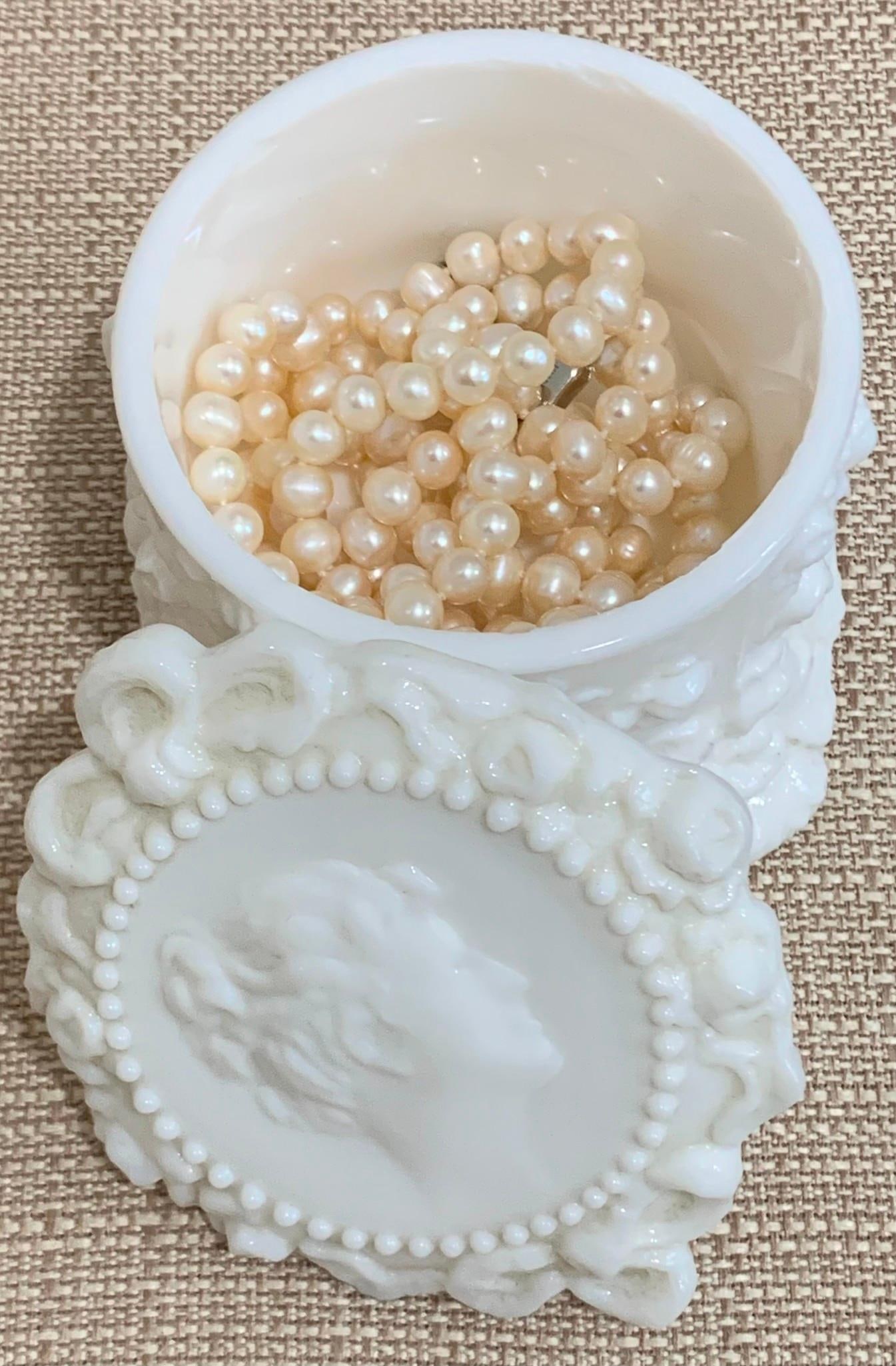 Luminous Freshwater Pearl Necklace and Bracelet in Mid Century Jenny Lind Milk Glass Dresser Box: Divine Victorian style high relief cameo design, no damage to the milk glass, 4 1/4 IN x 3 IN, 34 IN circumference 8mm freshwater pearl necklace with working clasp, 8 IN length 8-9mm freshwater pearl 