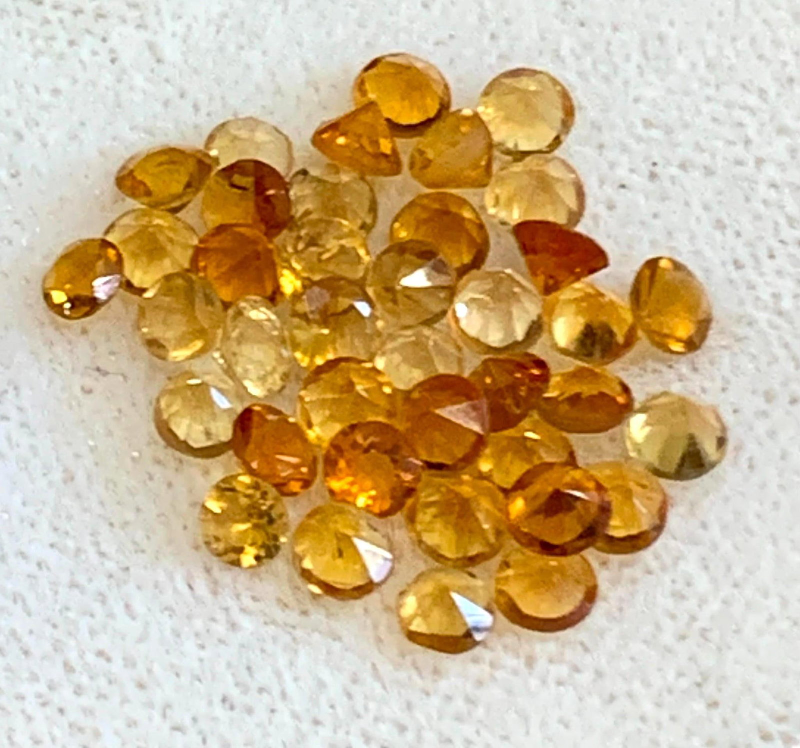 39 pcs 3mm Faceted Citrine Unmounted Loose Jewelers Gemstones: Soft hued to vibrant, each approx. 3mm in size, fantastic sparkle.