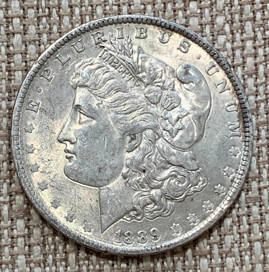 Fine 1889 Morgan Silver Dollar High Relief US Coin: Fantastic brilliance and exceptional definition.