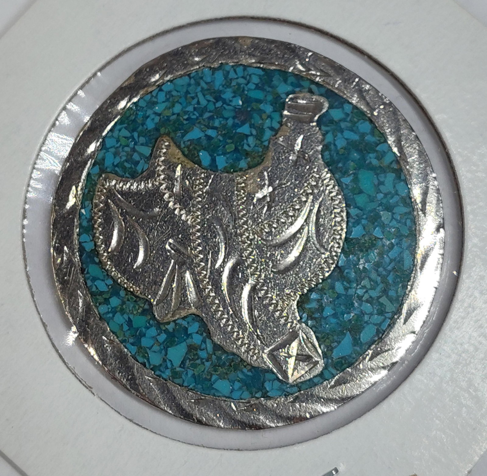 Mexican Silver Tone w/ Stone and Turquoise Inlay Token: Great condition unmarked token unsure of metal buying as is?1.5 in . diameter?