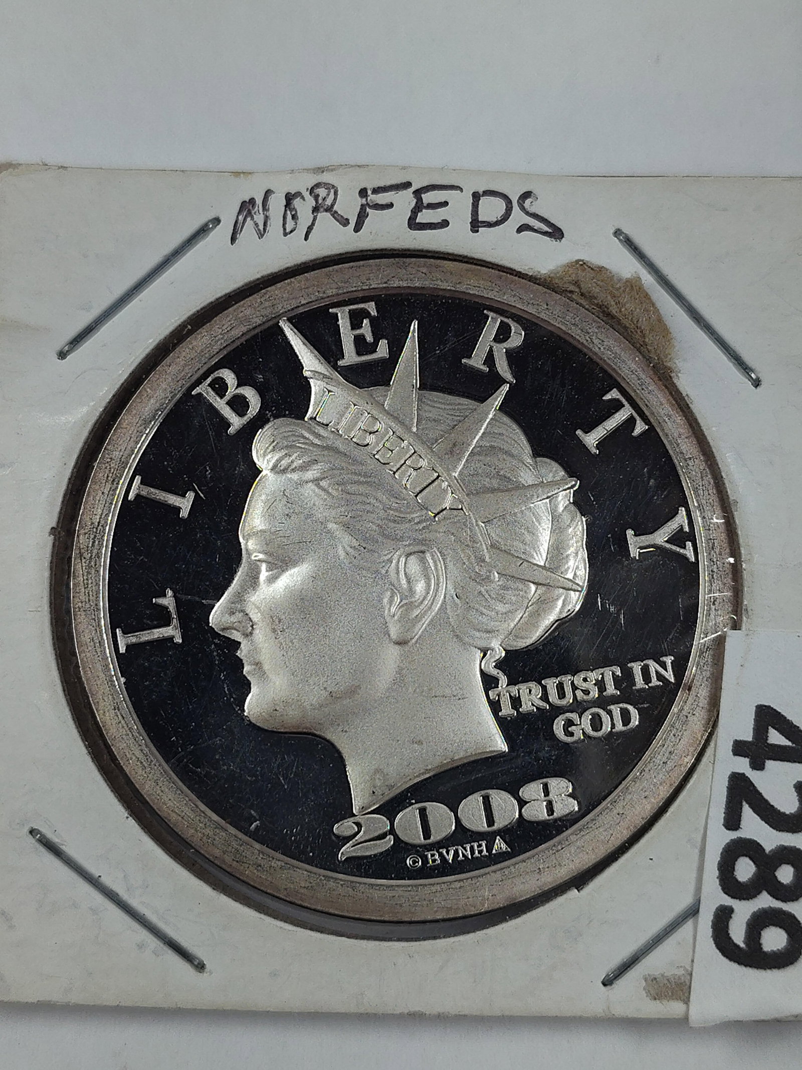 2008 NORFED Liberty Dollar ($50) One Ounce Silver Round Tenth Anniversary Edition: Showing minor tarnishing to reverse?One oz. .999 Fine Silver?