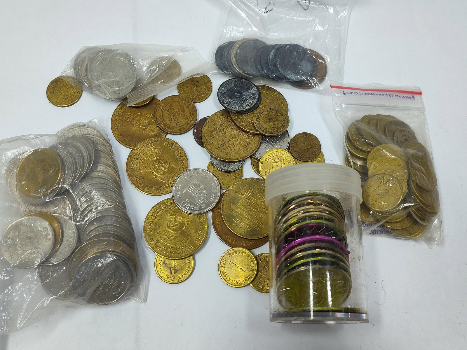 Large Lot of Various Tokens: This lot is loaded with early to newer tokens as shown in photos
