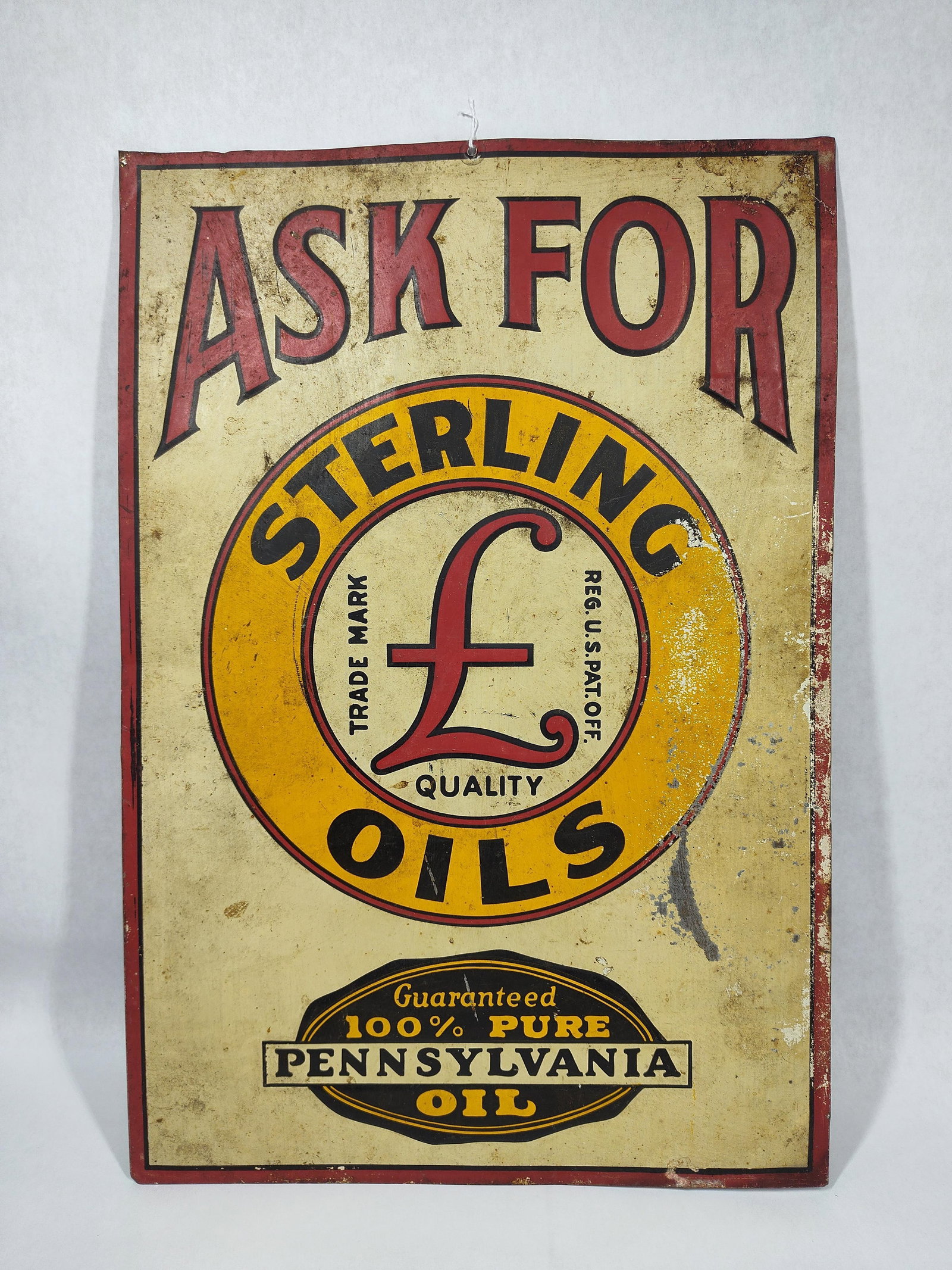 SST Ask For Sterling Oils embossed sign: 1-sided painted metal embossed sign with areas of paint wear and some soiling but will display well!! 13.5in x 19.75in.