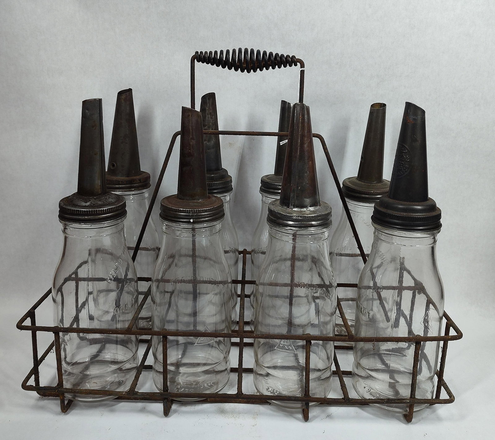 8-Glass Oil bottles with carrier: All bottles are identical.