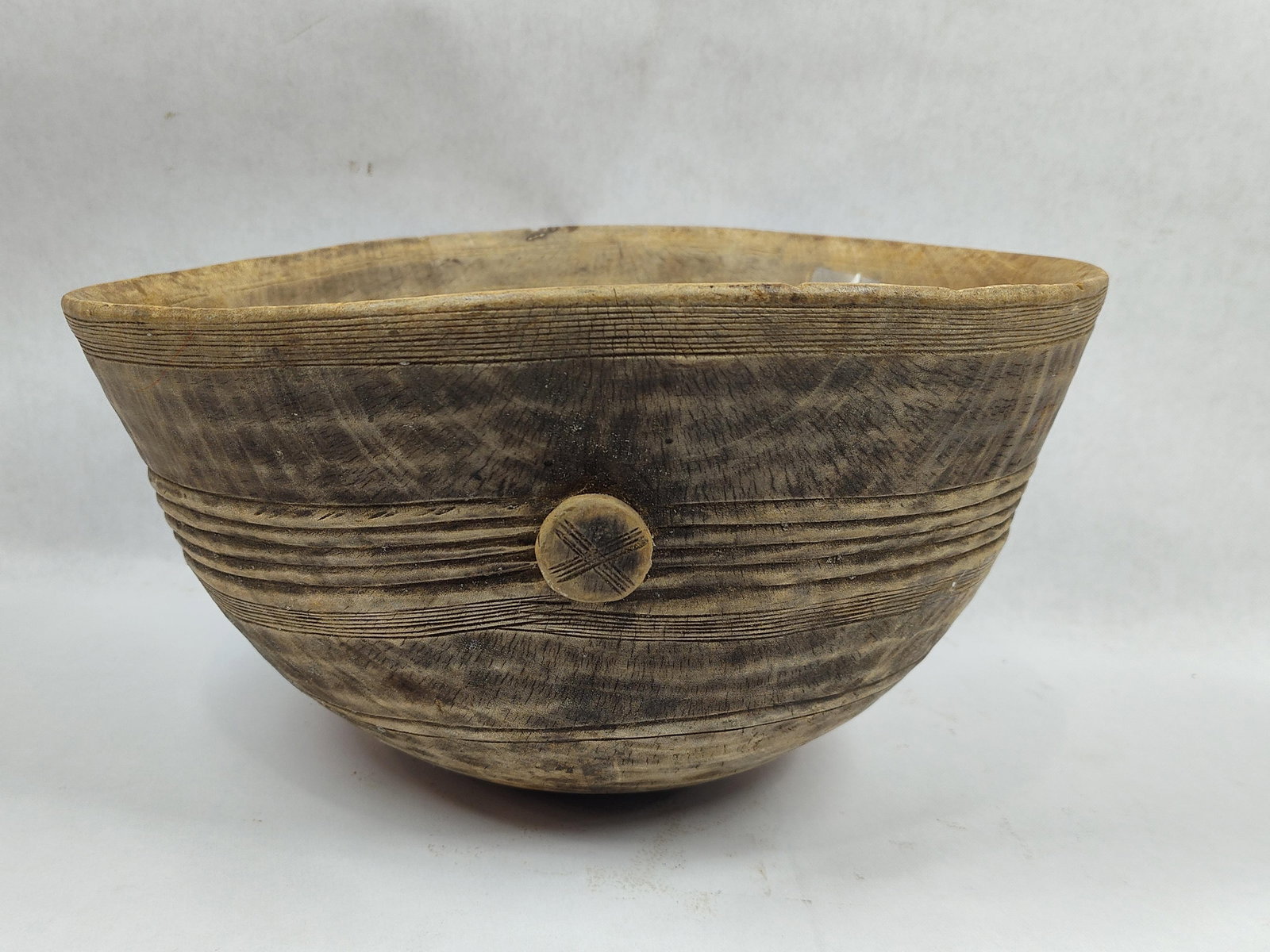 Primitive Tribal Carved African Wooden Bowl: 12in diameter.