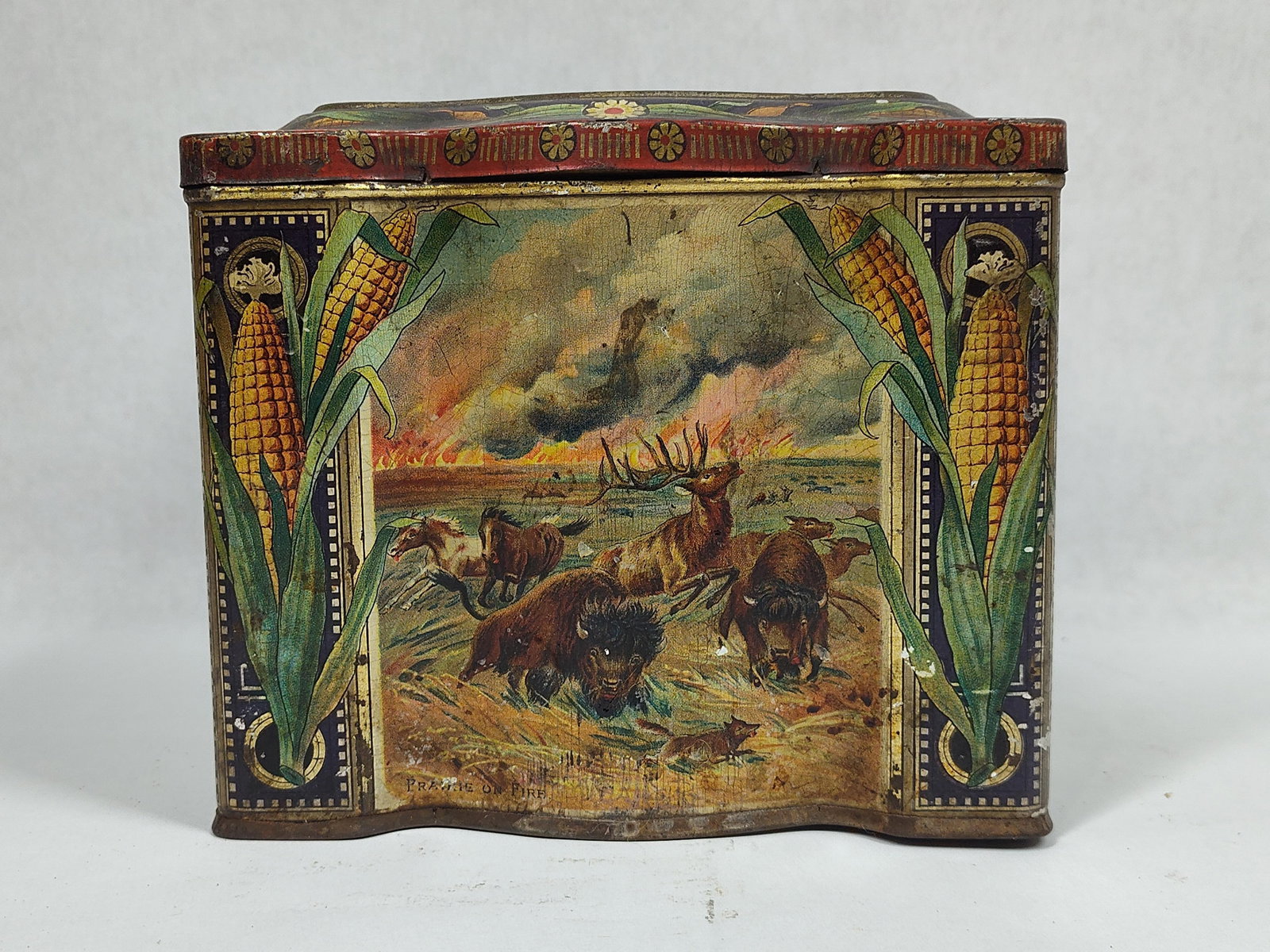 Outstanding graphical Keen's Mustard Seed Tin: With original label on interior hinged lid. Various scenes on all sides, The Hunters Return on lid, Prairie on fire on front, A Duel on left side, The Royal Mail on right side, and Buffalo Hunting on