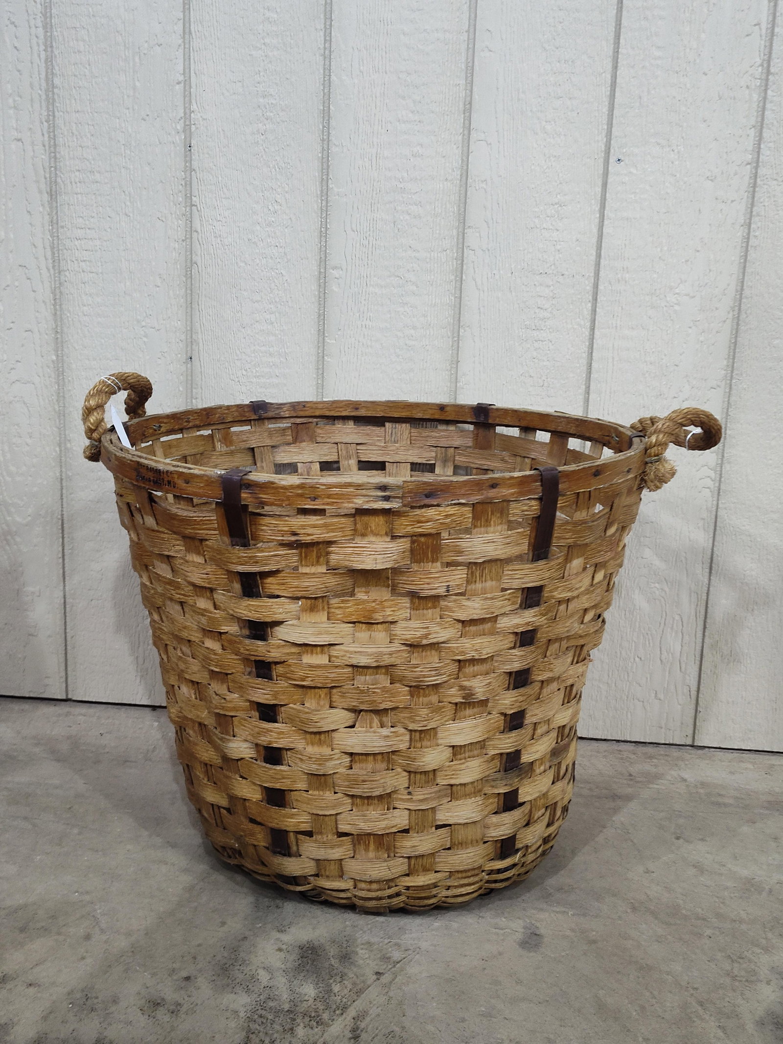 Oversized 19th century American Oak Splint Basket: Shows a few minor chips and breaks but overall is in great condition for its age. 25in diameter 21in tall.