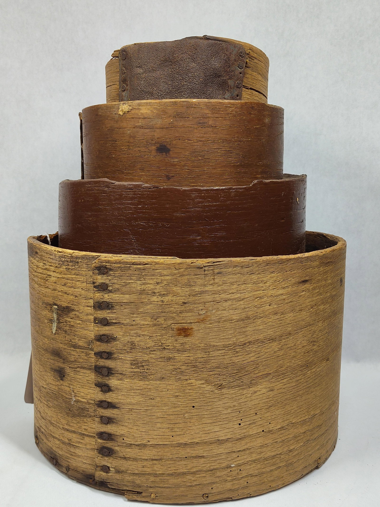 Primitive 4pc Dry Grain Measures: 5.75in, 7in, 8.75in & 11in diameters. All show some edge wear.