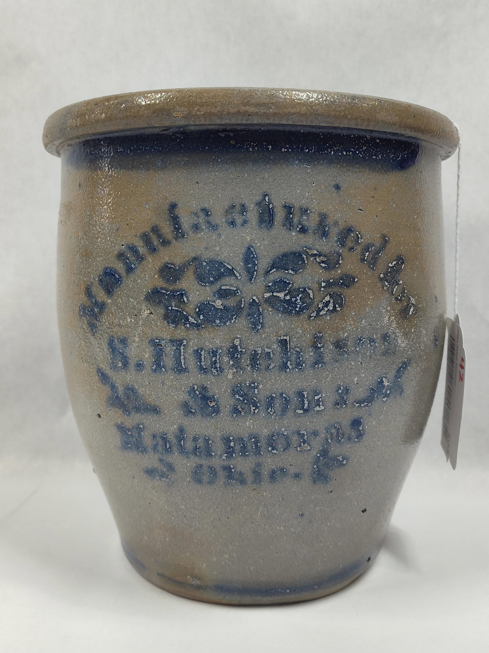 S. Hutchinson & Sons 1gal Stoneware Jar: Stenciled graphics read: Manufactured for S. Hutchinson & Sons Matamoras, Ohio. Great condition! No chips or cracks!! 8.5in tall.