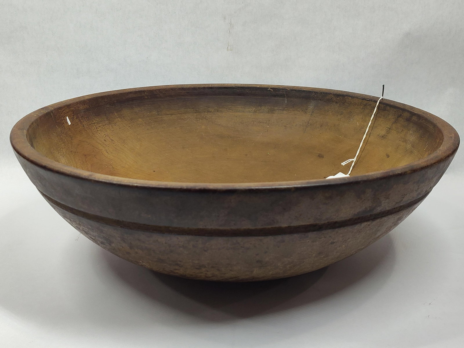 Large Wooden Bowl: With original surface. 18in diameter.