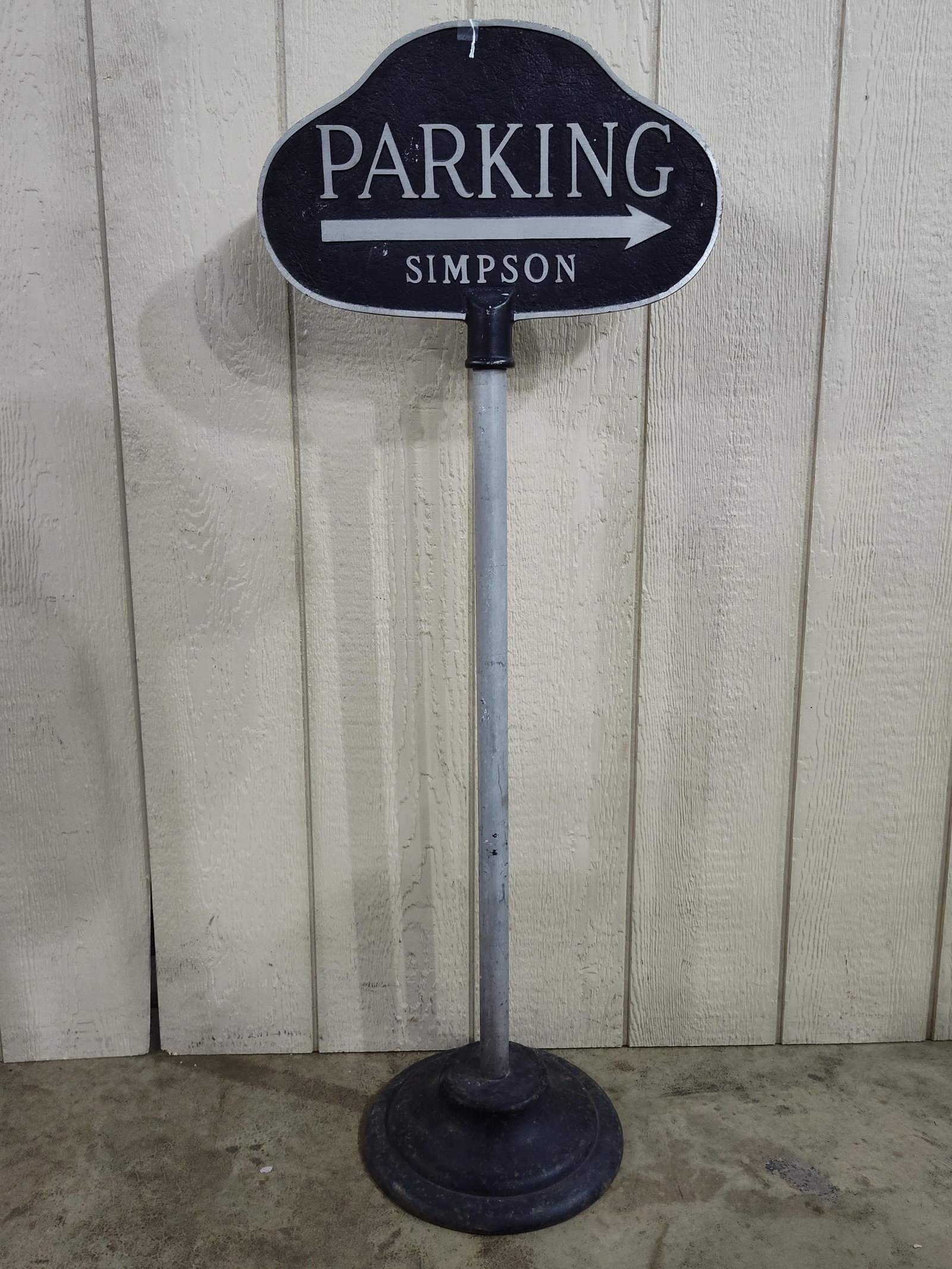 Simpson Funeral Home Parking Curb Sign: 2-sided cast aluminum sign on iron base. Sign is 17.5in wide 10in tall overall height is 47in.