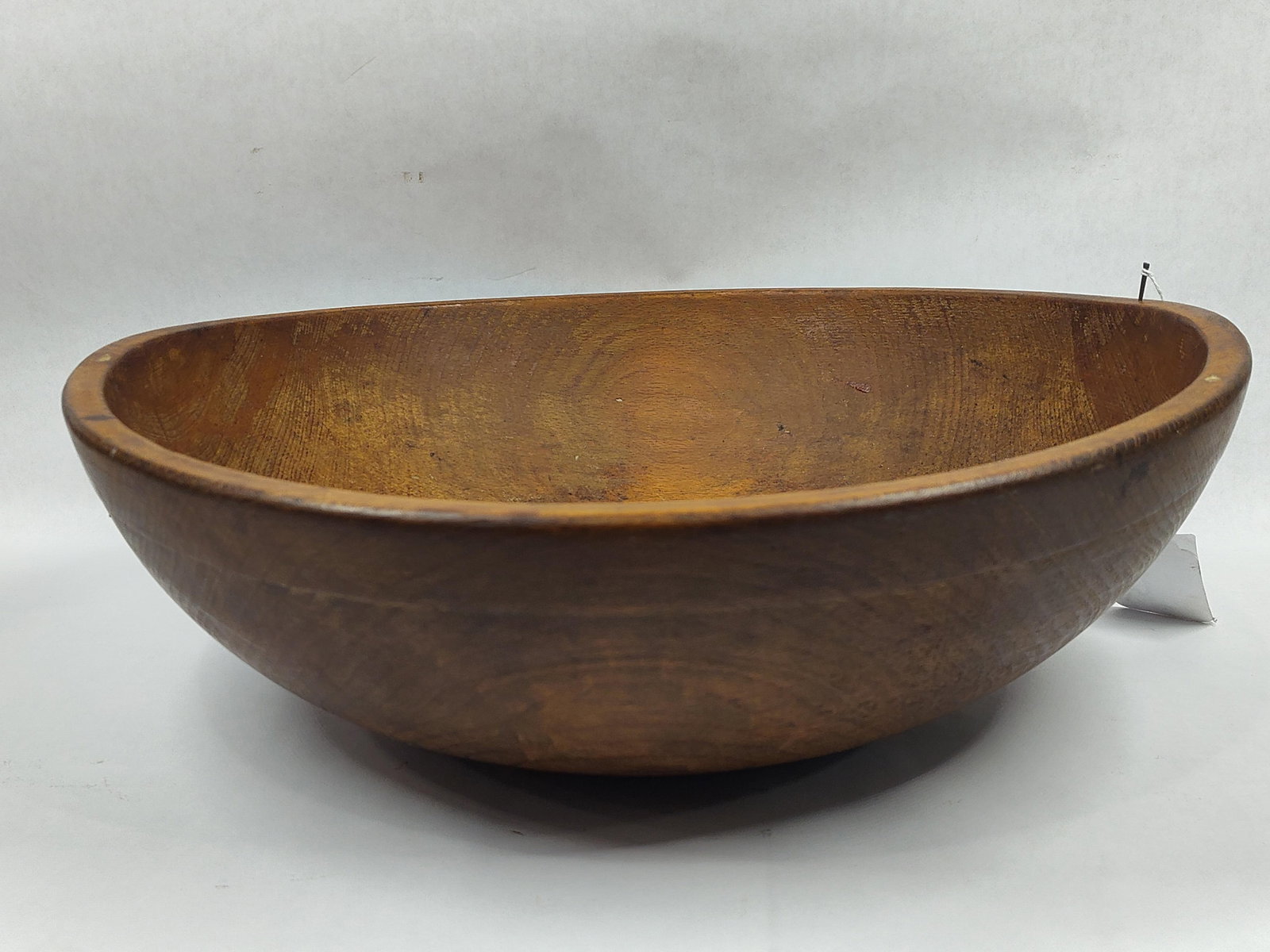 Primitive wooden butter bowl: 16in diameter.