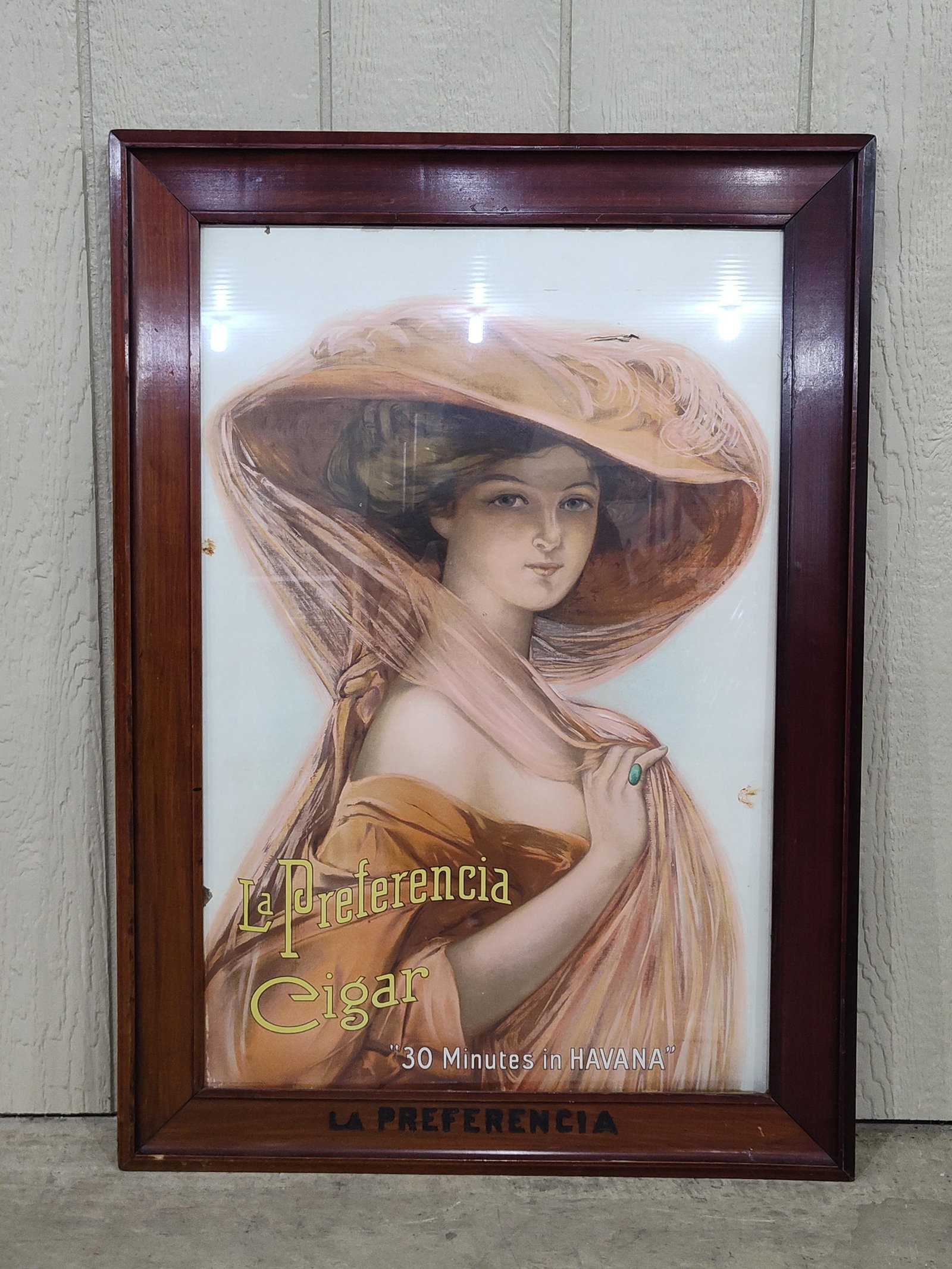 LaPreferencia Cigar framed cardboard litho: Shows a puncture in headdress and in lower left edge and also a few smudges. Marked Copyright 1911 Havana-American Cigar Co. NY. In lower left corner. 25.5in x 35.5in framed.
