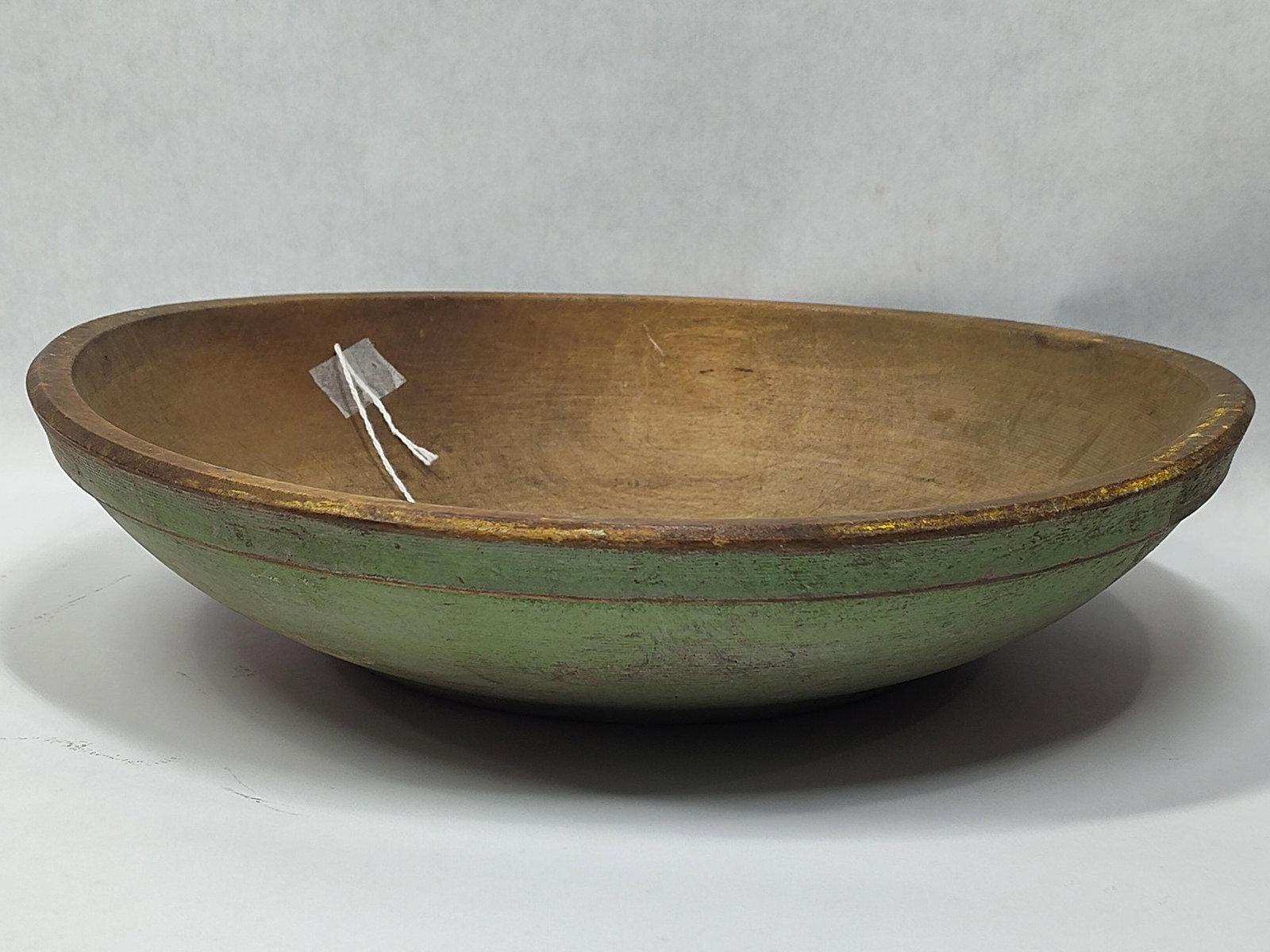 Painted Wooden Butter Bowl: Does have a repaired chip and shows 2 cracks but with great paint!! 12in diameter.