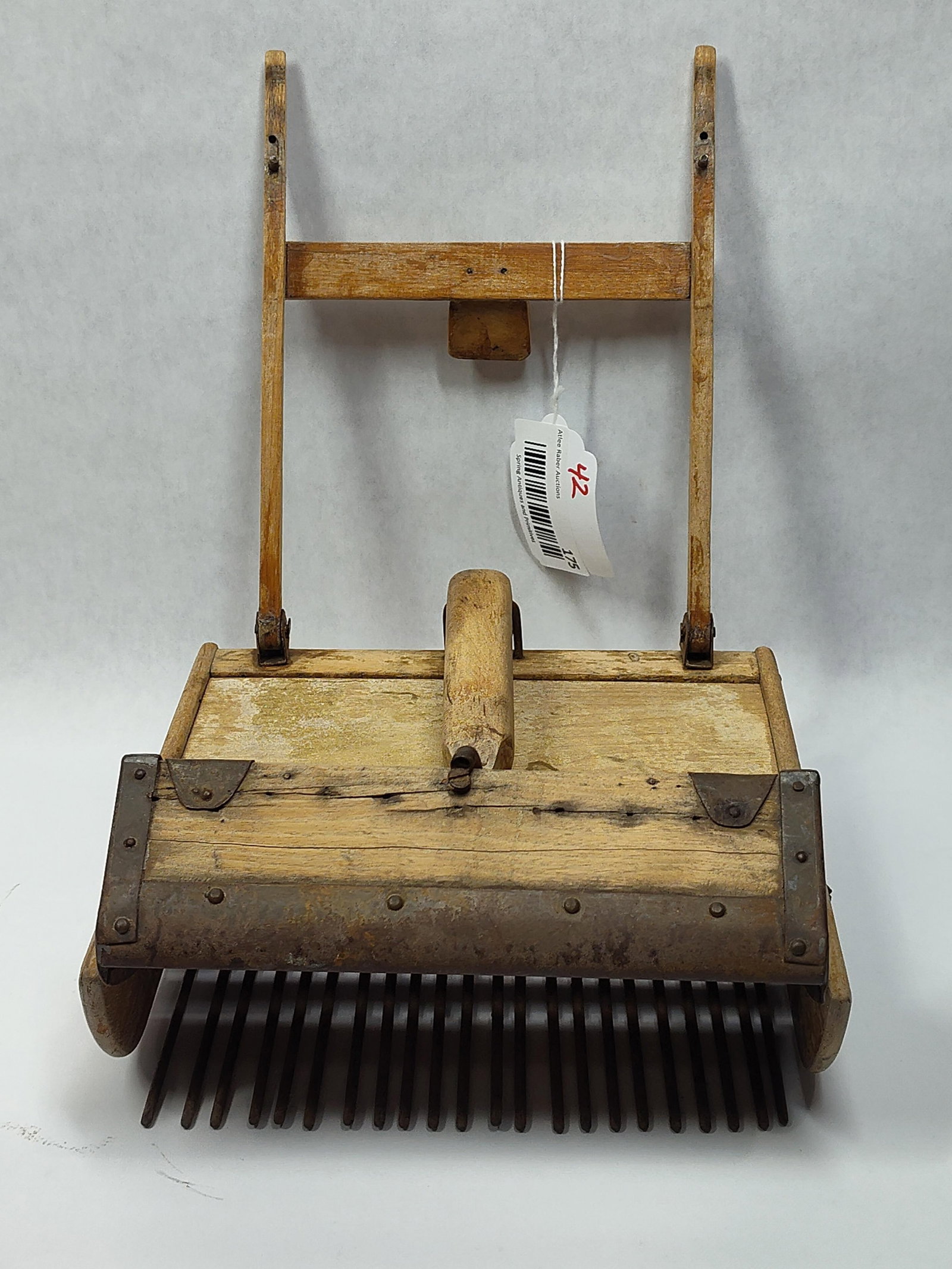 Very Early Unusual Cranberry Scoop: Nice unusual small scoop with spring hinged front cover and with initials RAC carved on back. 8.5in wide 8.75in deep.