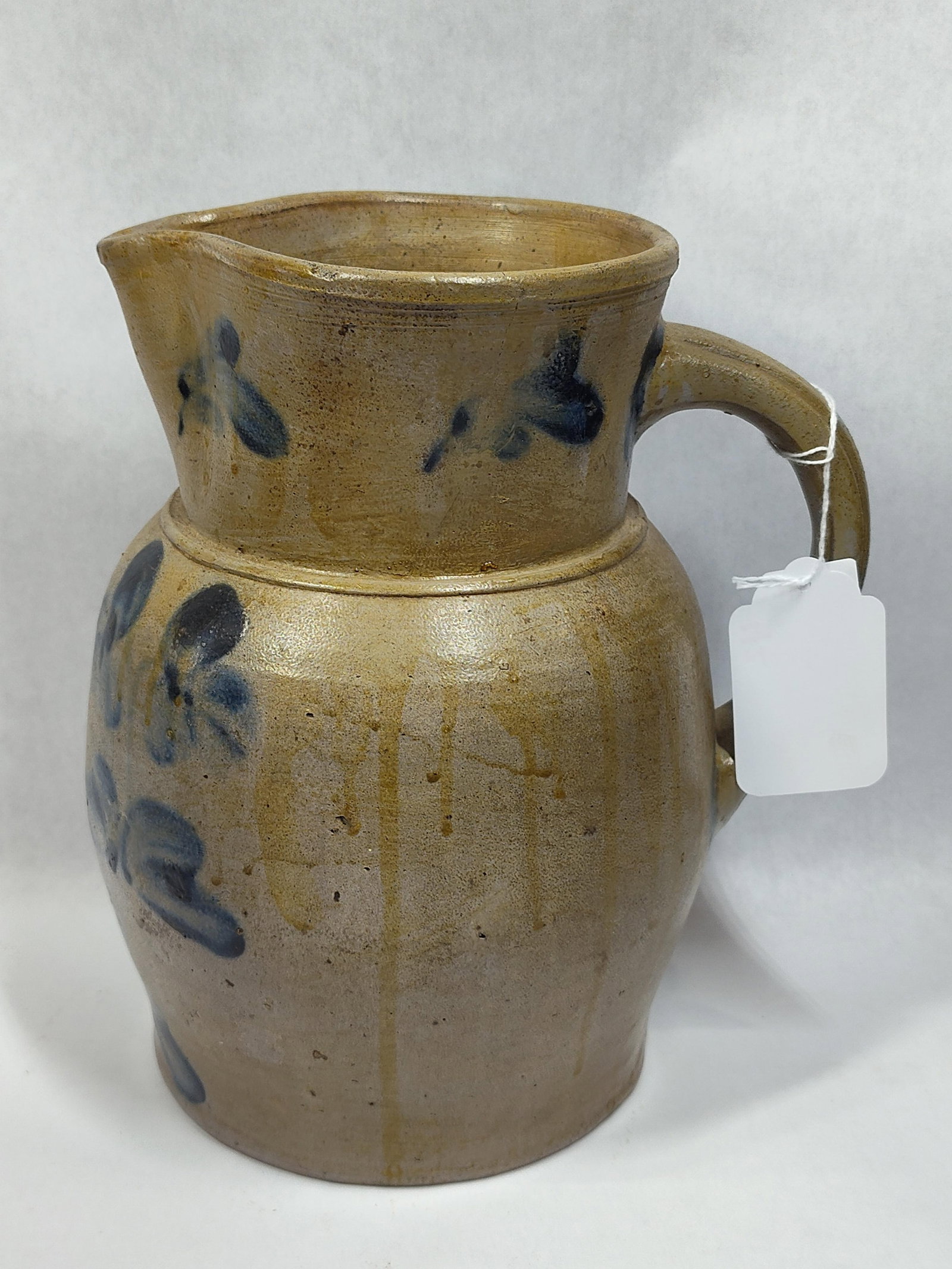Henry Remy Decorated Stoneware 1gal Pitcher: Baltimore, MD. Beautiful piece but found a few tight hairlines, (almost not visible). Approximately 1-gal capacity. 9.75in tall.