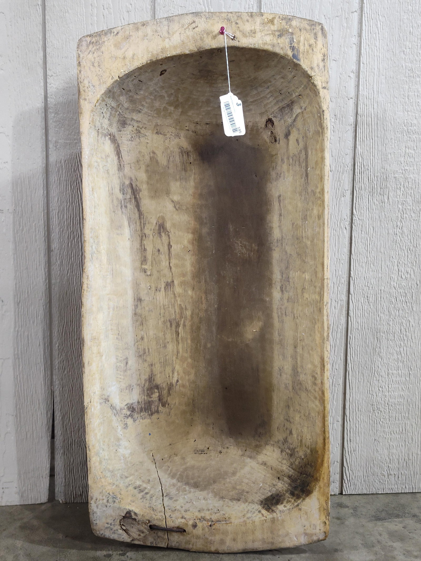 Large Primitive Trencher Dough Bowl: Great early condition showing crack w/ repair to one end measuring 16 W x 37 L 