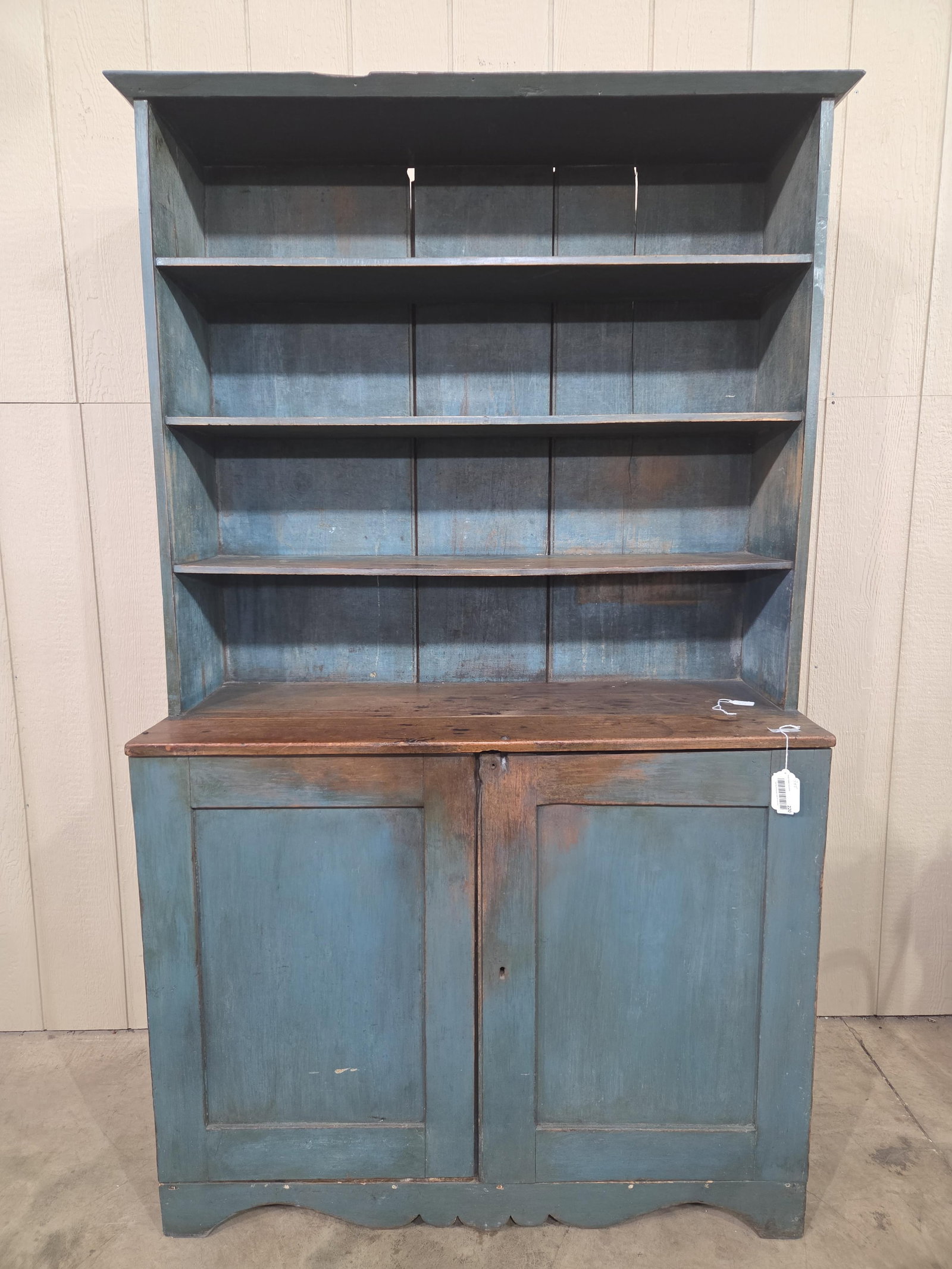 Awesome 1840's PA Blue Painted Stepback Cupboard: Excellent early Pennsylvania cupboard with blind doors in bottom and open top!! Great blue paint, sq nailed construction and has that awesome primitive look!! Circa 1840's. 45in wide 18in deep