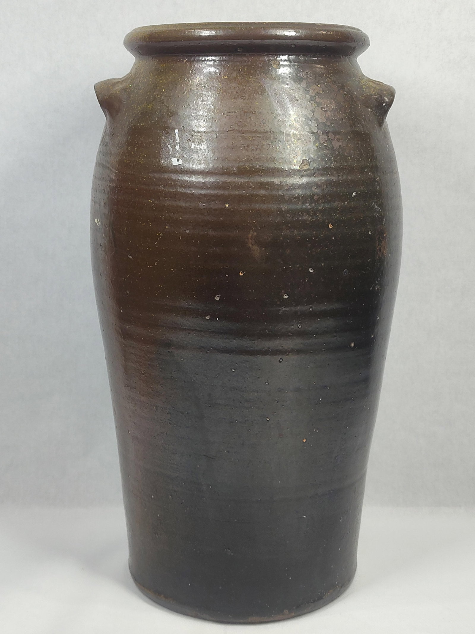 Late 19th. C Southern Alkaline Glazed Stoneware Pottery Cylindrical Body Crock Storage Jar: Great overall condition for age showing chipping to underside of handle to one side as shown in photos with crock jar standing 18 in H 