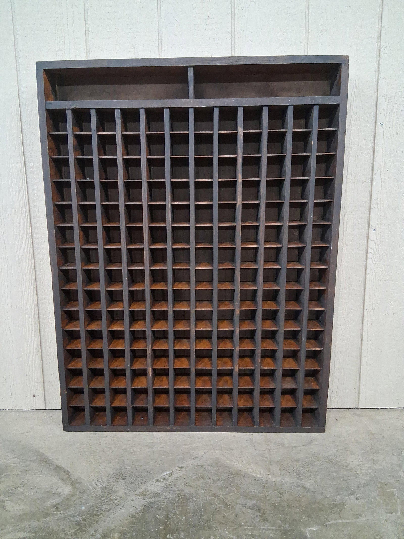 Federal Equipment Co. Oak Printers Cabinet: Oak framed cubbie with 180 small slots. Probably used as a pharmaceutical or printer's cubbie. Stenciled on cardboard backer Federal Equipment Co. Shelby, NC. 31in wide 4.5in deep 41in tall.