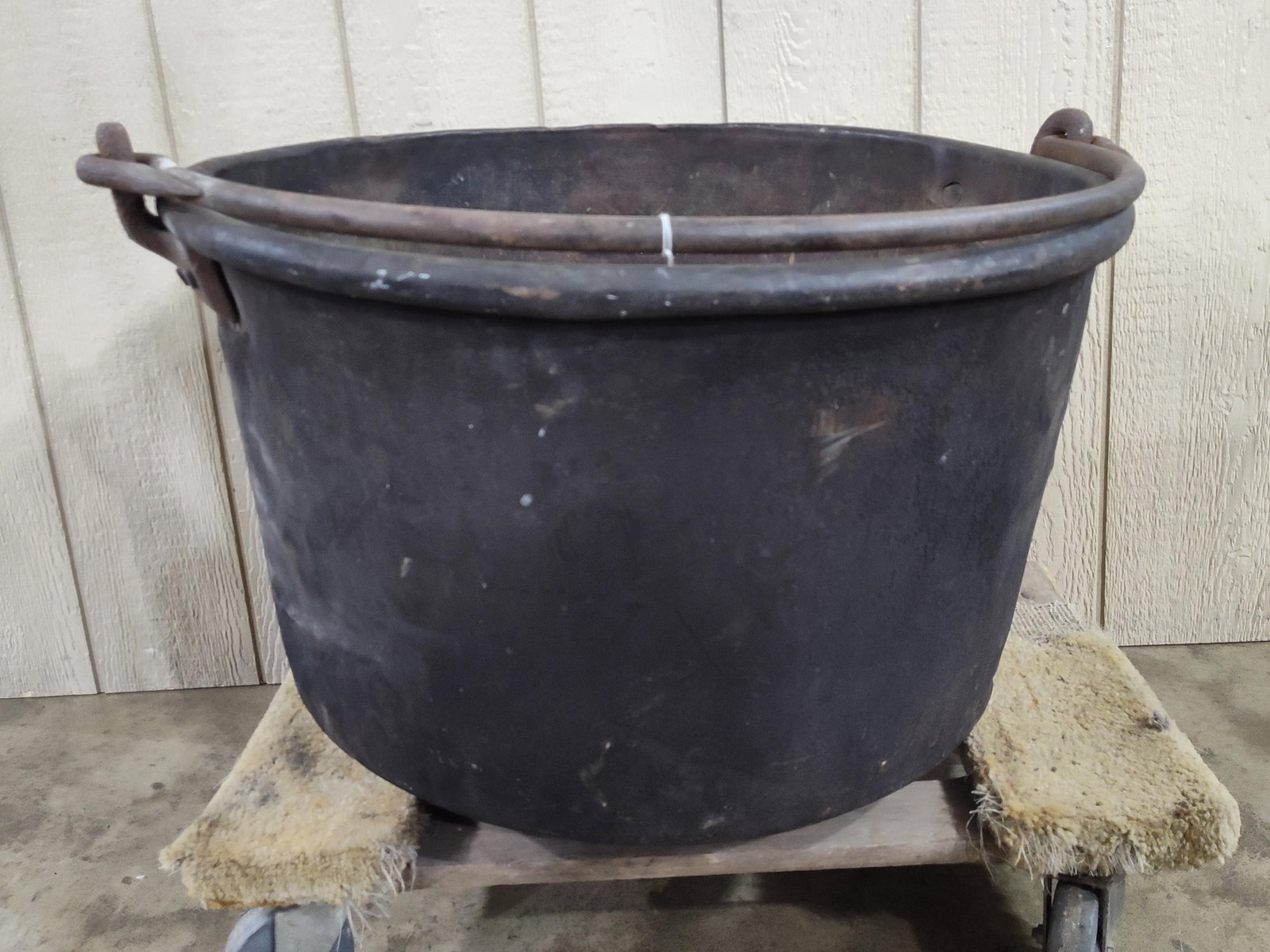 Large Dovetailed Bottom Copper Kettle: Shows some denting but overall is in pretty solid condition! Does not appear to have any holes. 28in diameter approximately 20in tall.