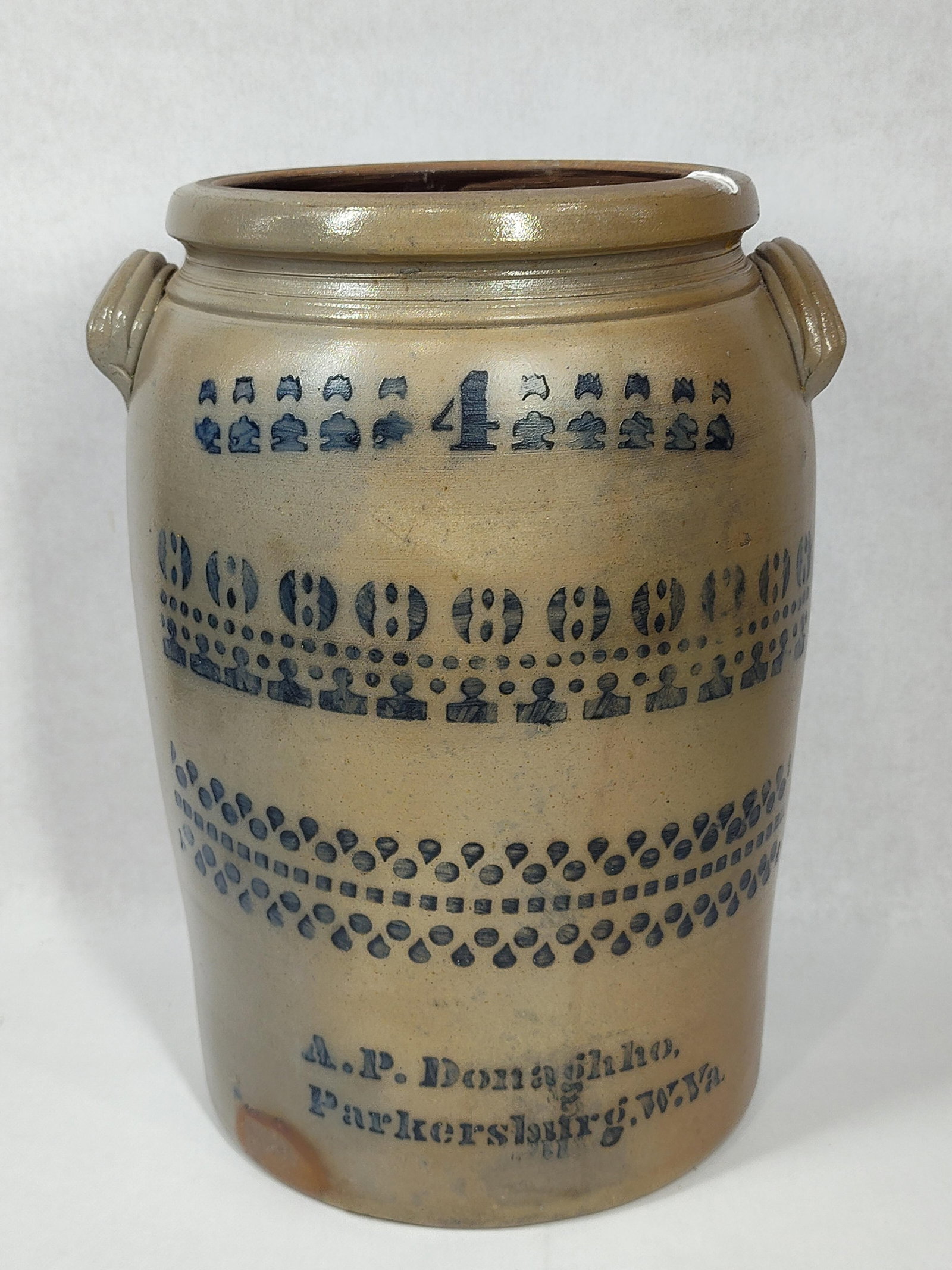 Highly decorated A.P Donaghho 4gal jar: Shows a 4in hairline on backside, otherwise in excellent condition!! No chips! 15in tall.
