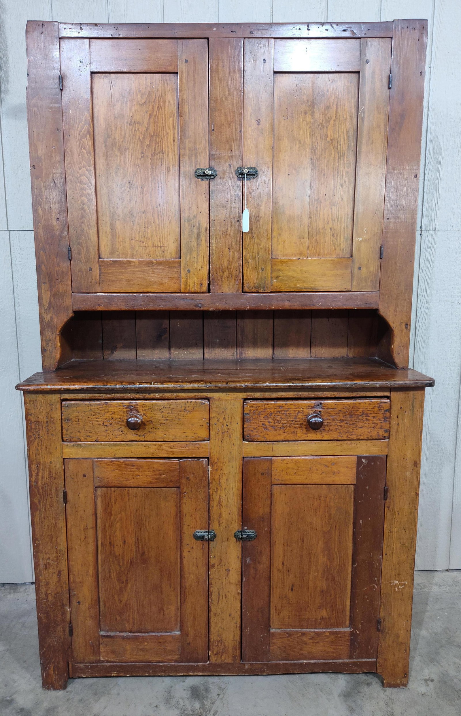 Primitive sq nailed Blind Door Stepback Cupboard: 1 piece cabinet with square nails, showing user character. Has a good look!! 48in wide 17.5in deep 81in tall.