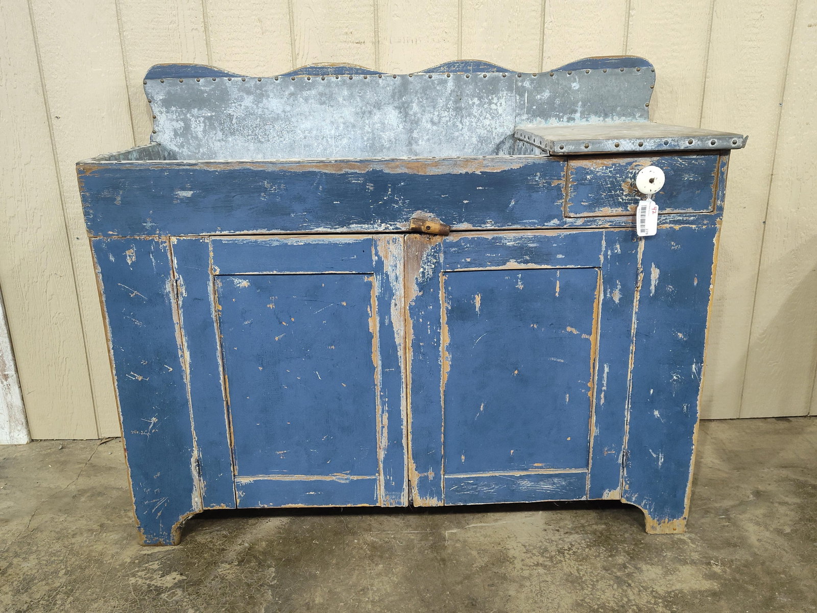 Excellent Tin Lined Drysink w/Scalloped Back: Nice early drysink with an awesome look!! Good paint and Scalloped top edge. Tin lining shows some oxidation and through corrosion to interior bottom. 48in long 18in deep 40in tall.