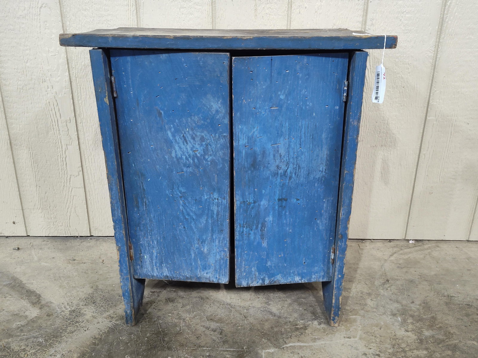 Small Painted 2-Door Cabinet: Nice small end table sized cabinet with great blue paint and sq nails! Shows a crack in top. 24in wide 16in deep 26in tall.