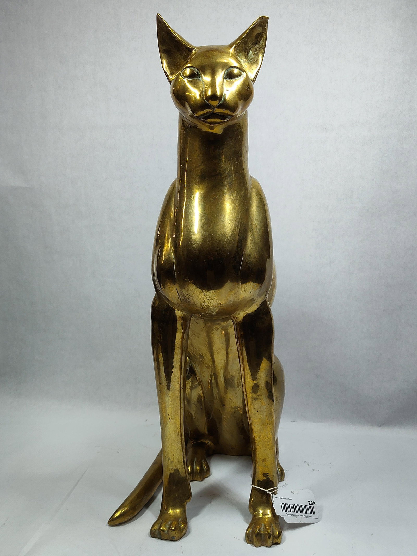 Oversized Brass Cat Sculpture: 24.5in tall.